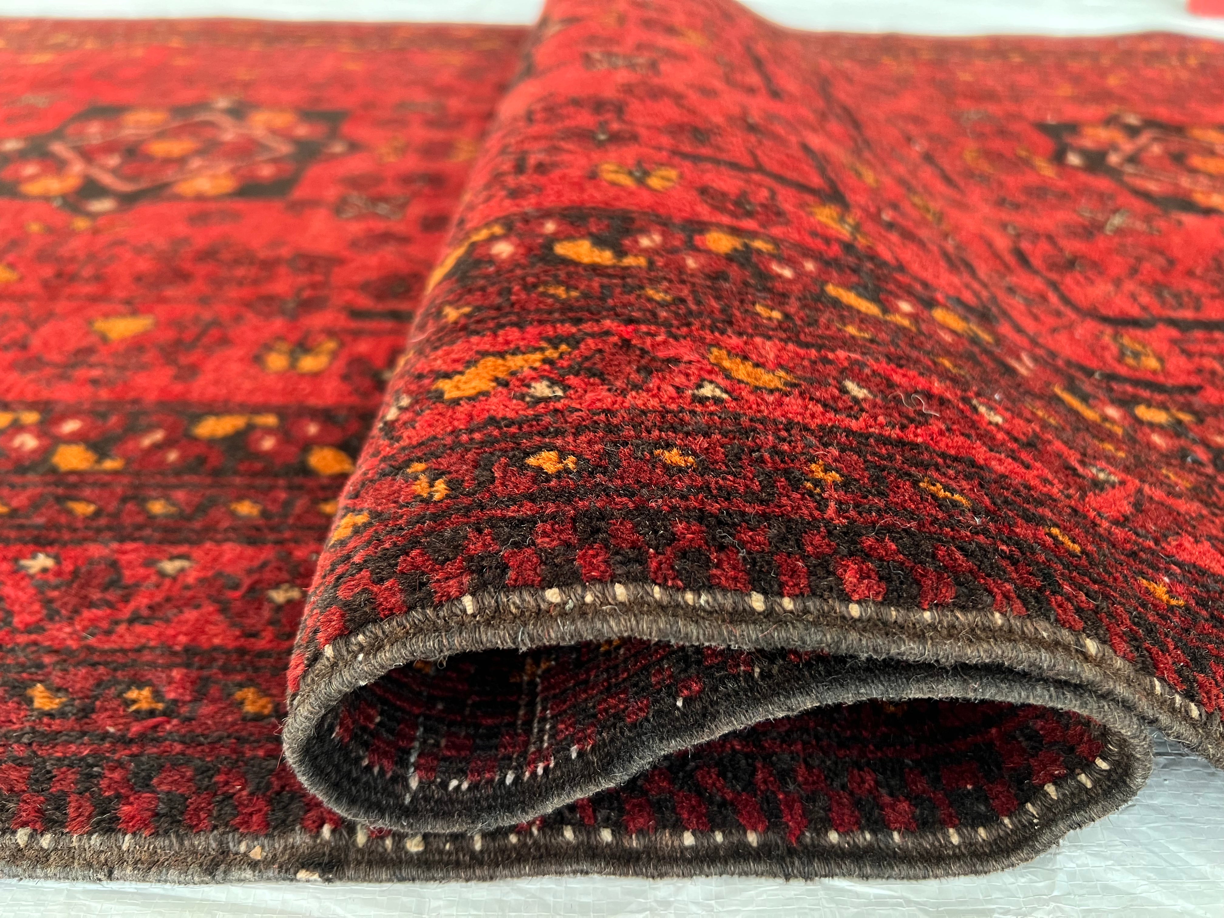 Afghani Rug 4x10 size range bukhara Red laid flat