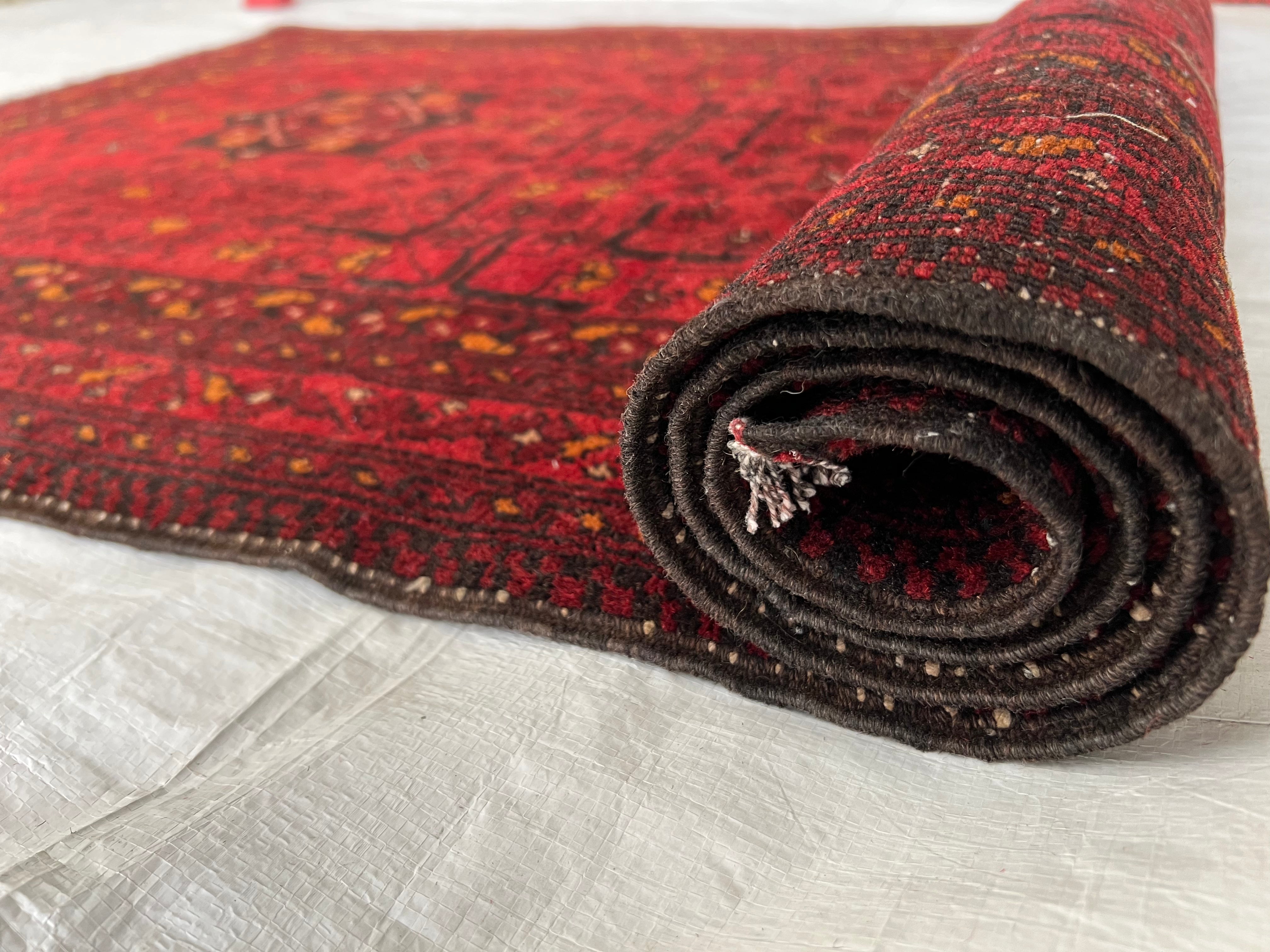 Afghani Rug 4x10 size range bukhara Red laid flat