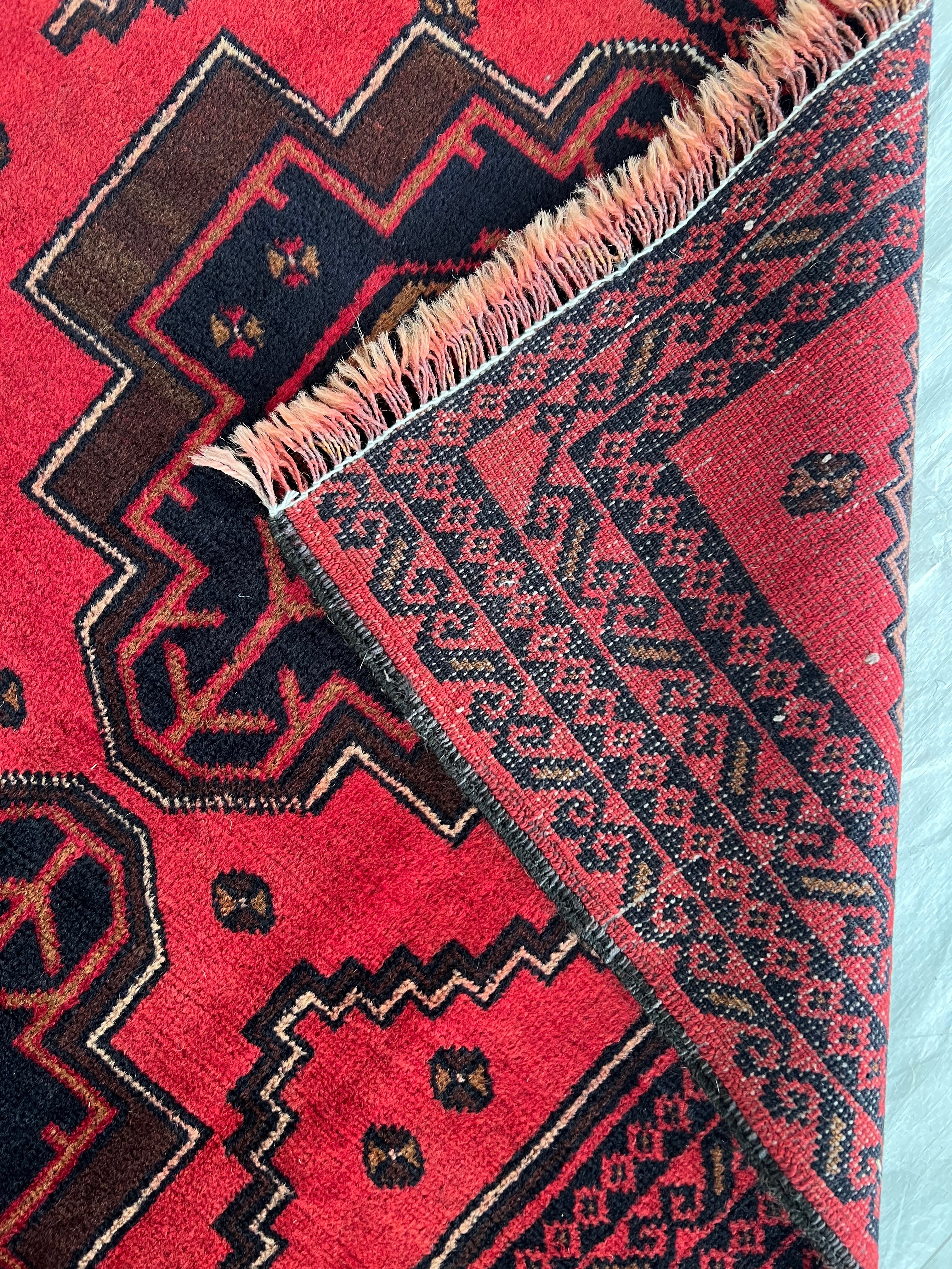 Afghani Runner runner size range tribal Red Blue laid flat