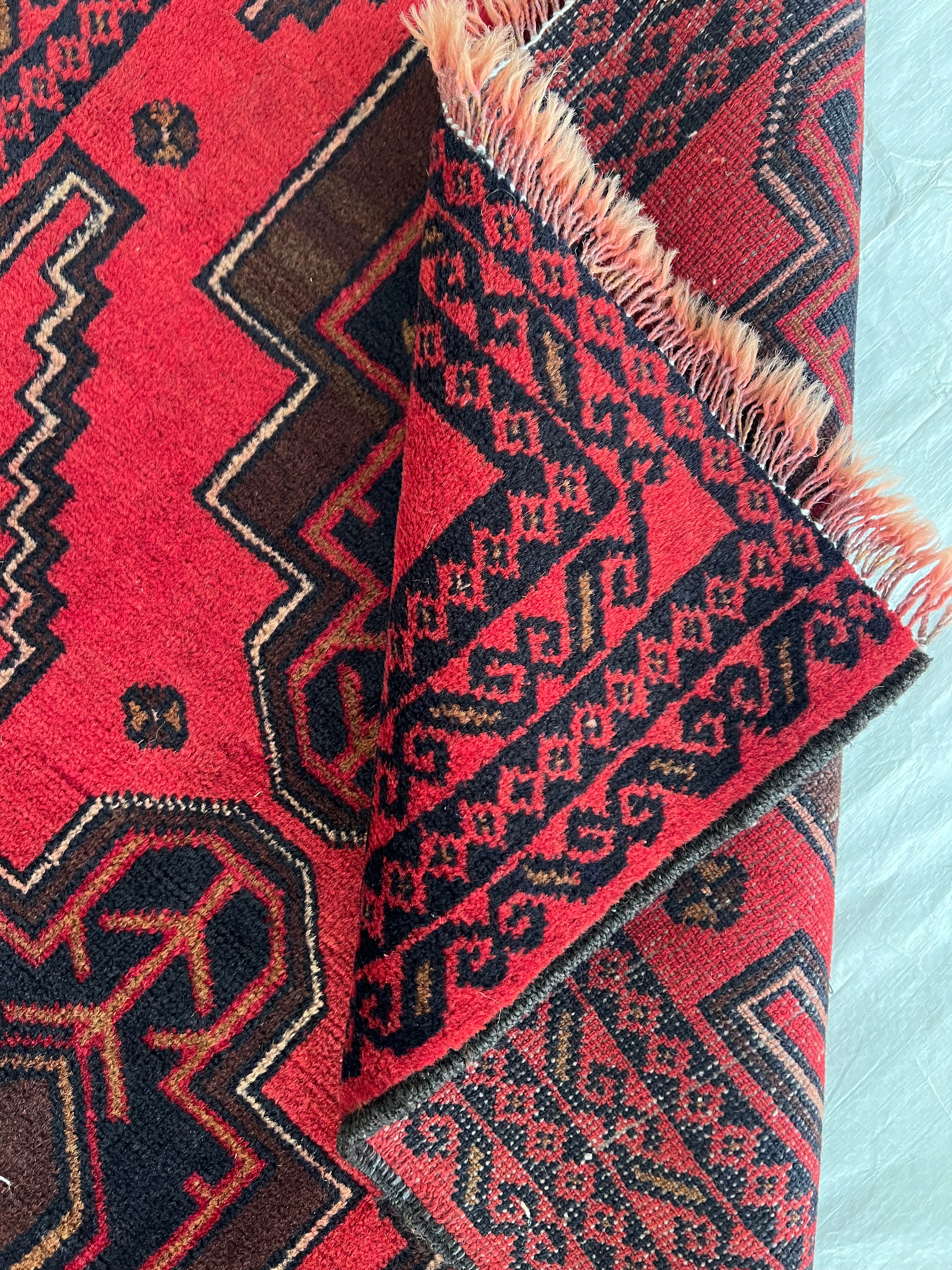 Afghani Runner runner size range tribal Red Blue laid flat