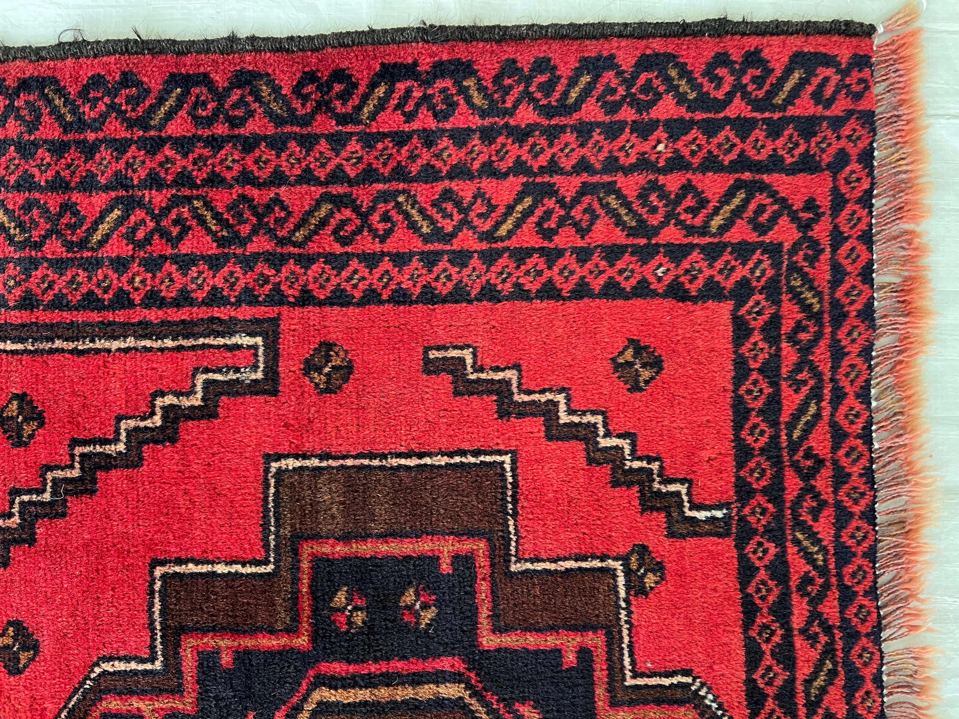 Afghani Runner runner size range tribal Red Blue laid flat