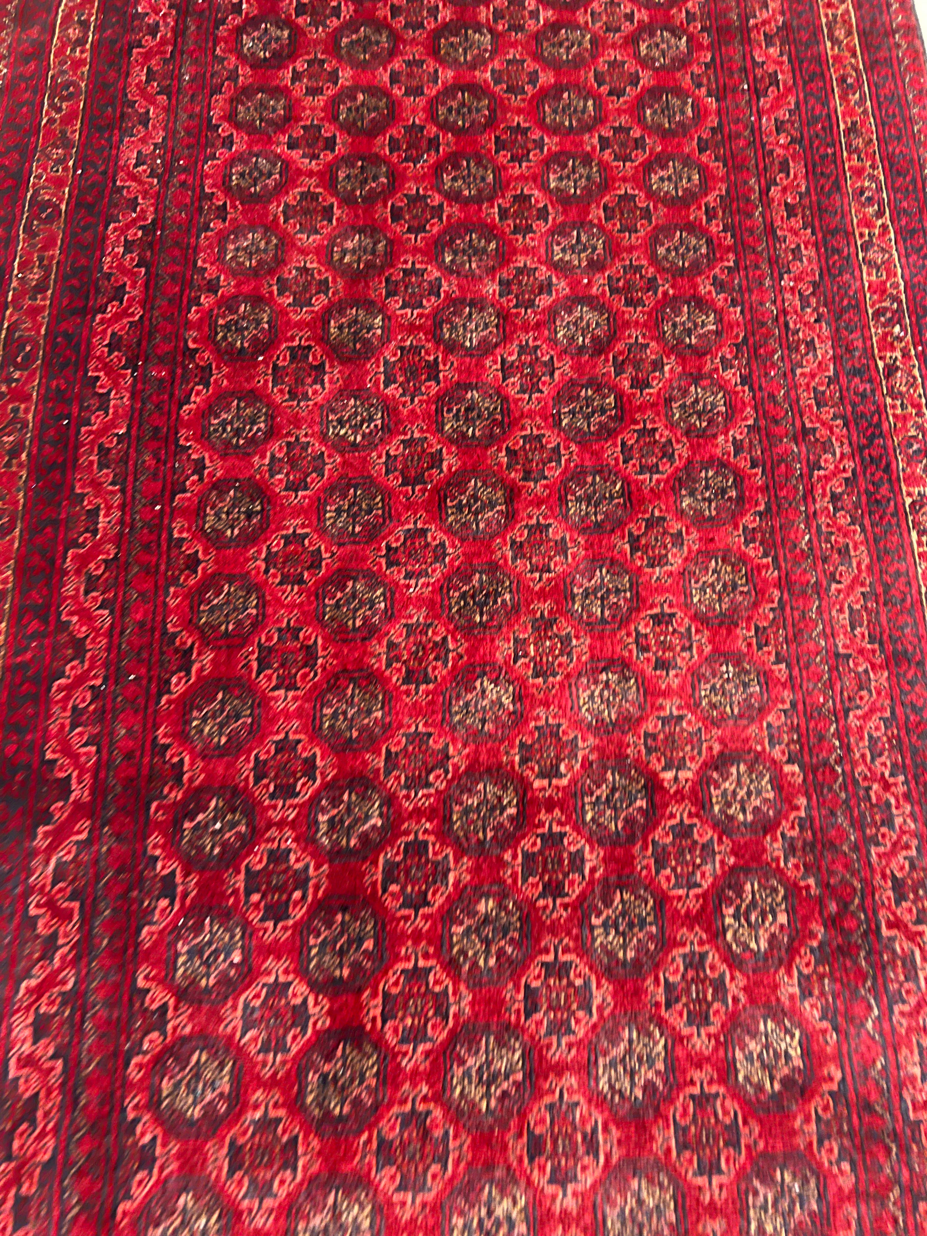 Afghani Runner runner size range tribal Red laid flat