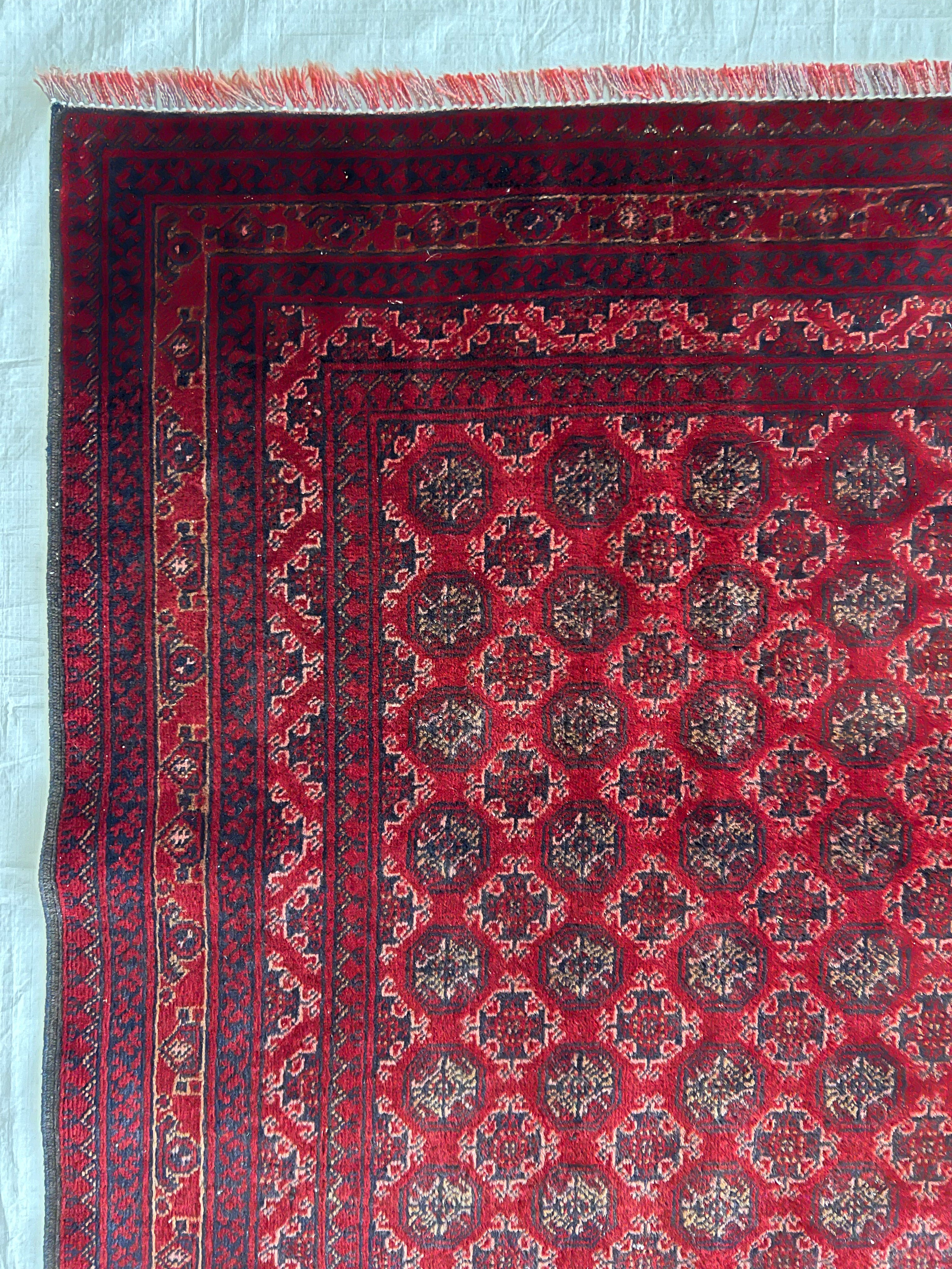 Afghani Runner runner size range tribal Red laid flat