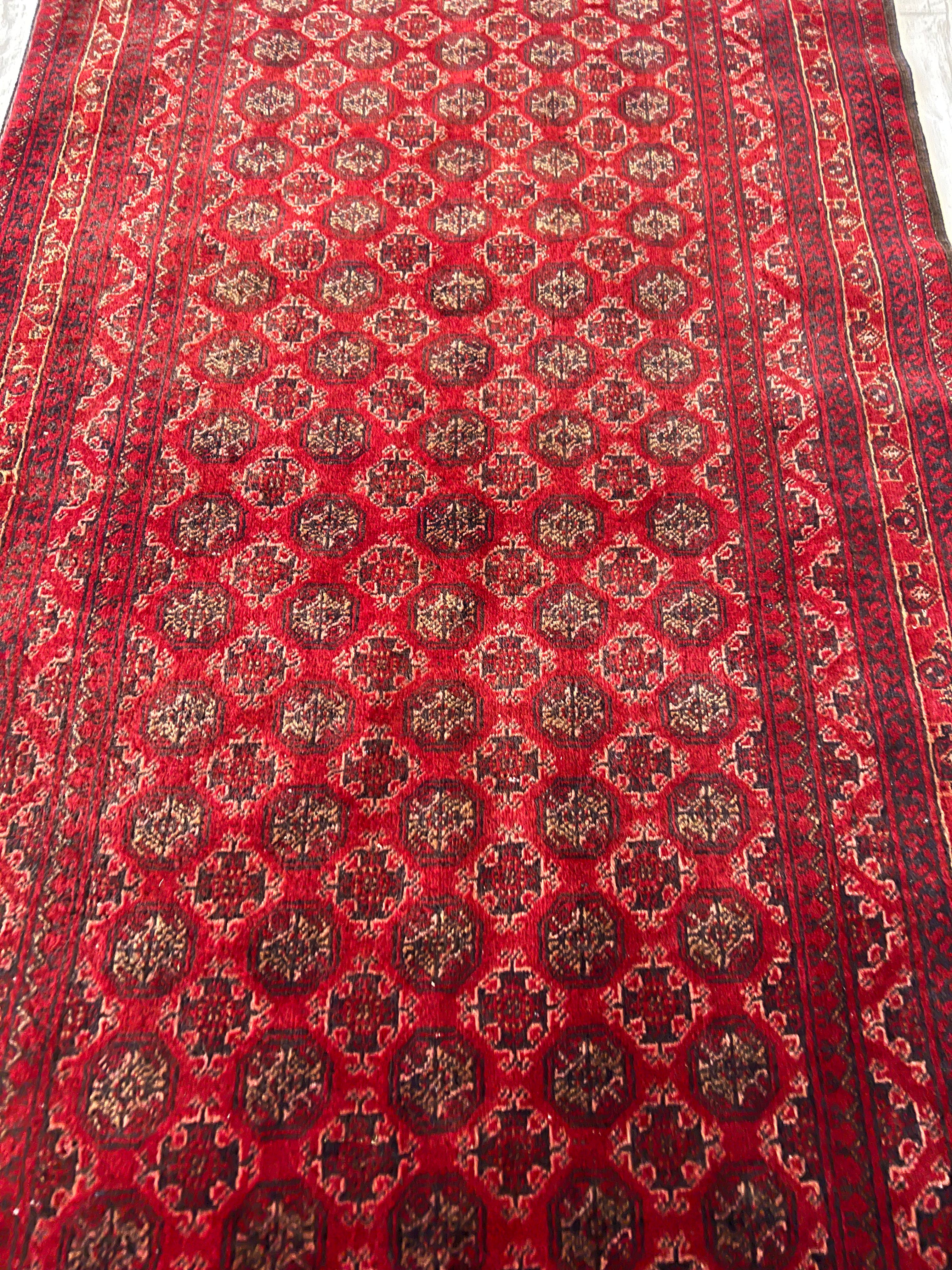 Afghani Runner runner size range tribal Red laid flat