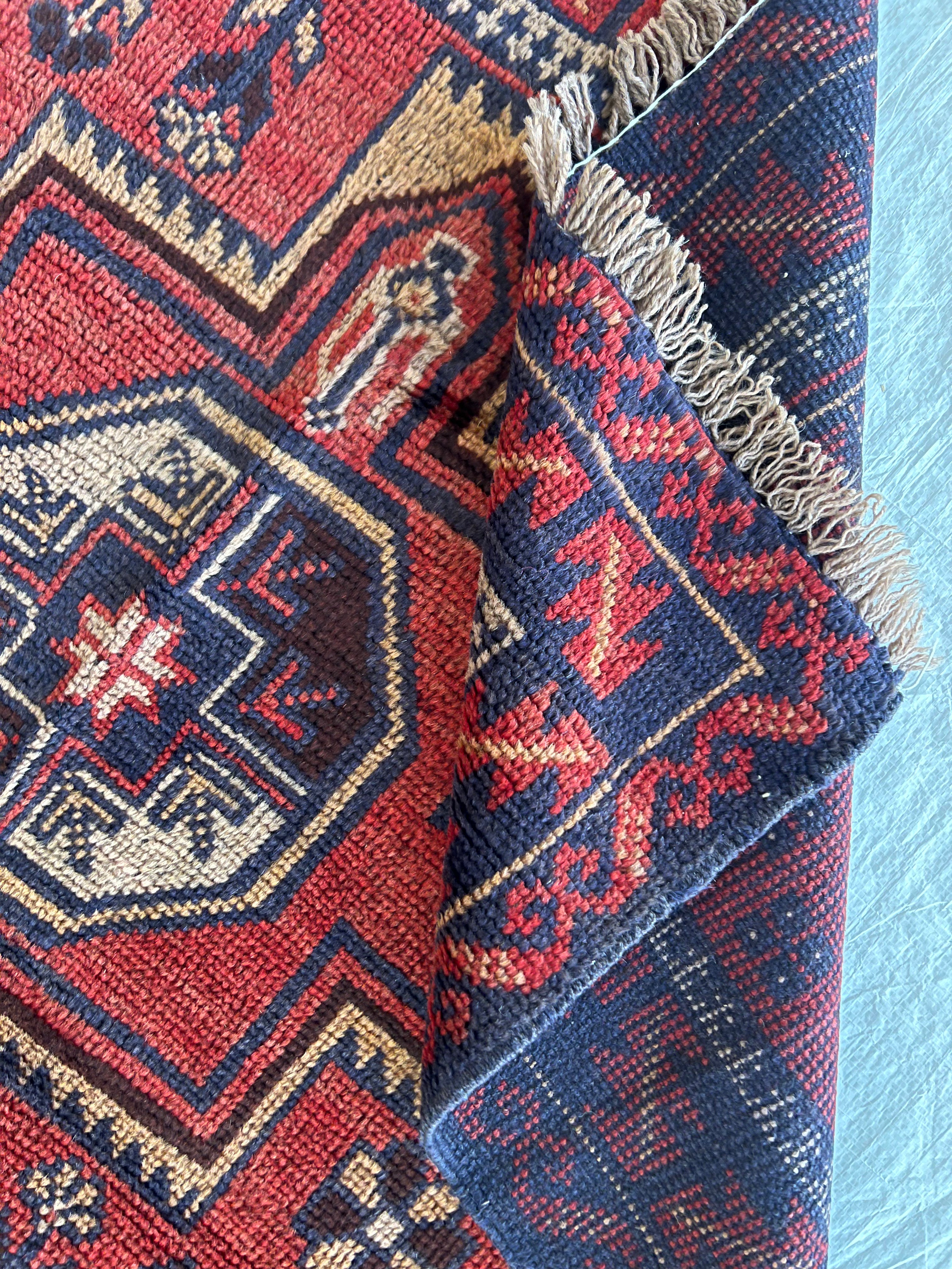 Afghani Rug 4x10 size range tribal Red Blue laid flat