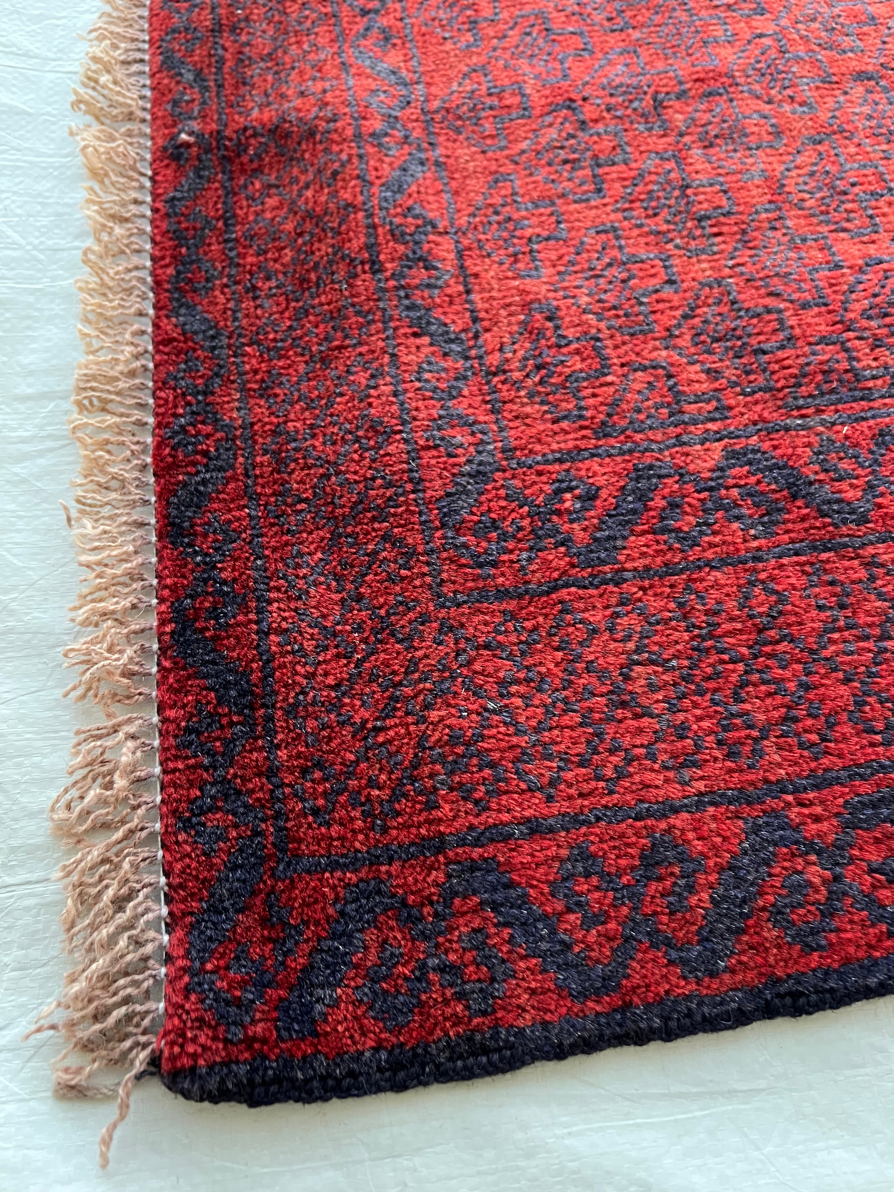 Afghani Runner runner size range tribal Red laid flat