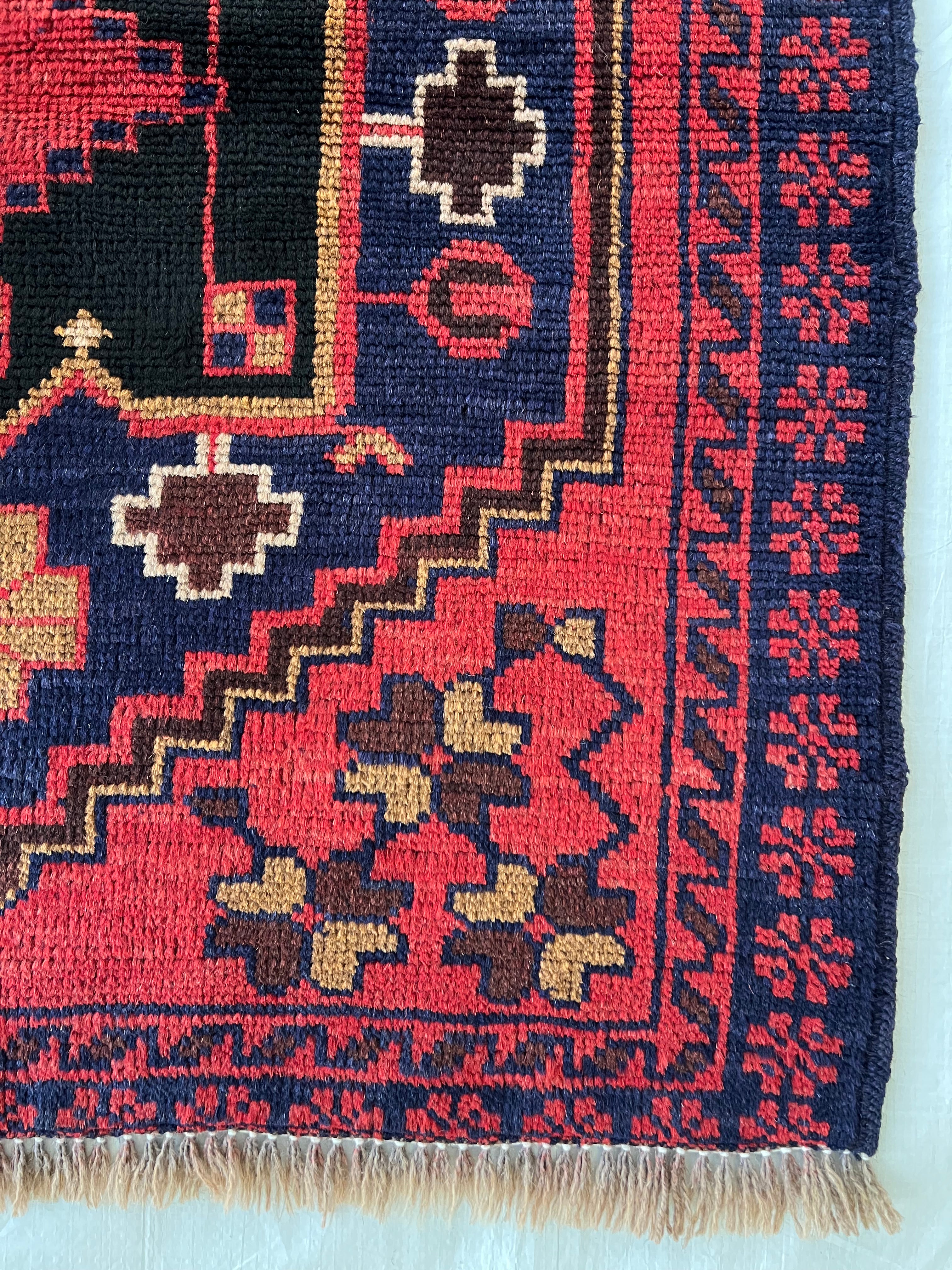Afghani Runner runner size range tribal Red Blue laid flat