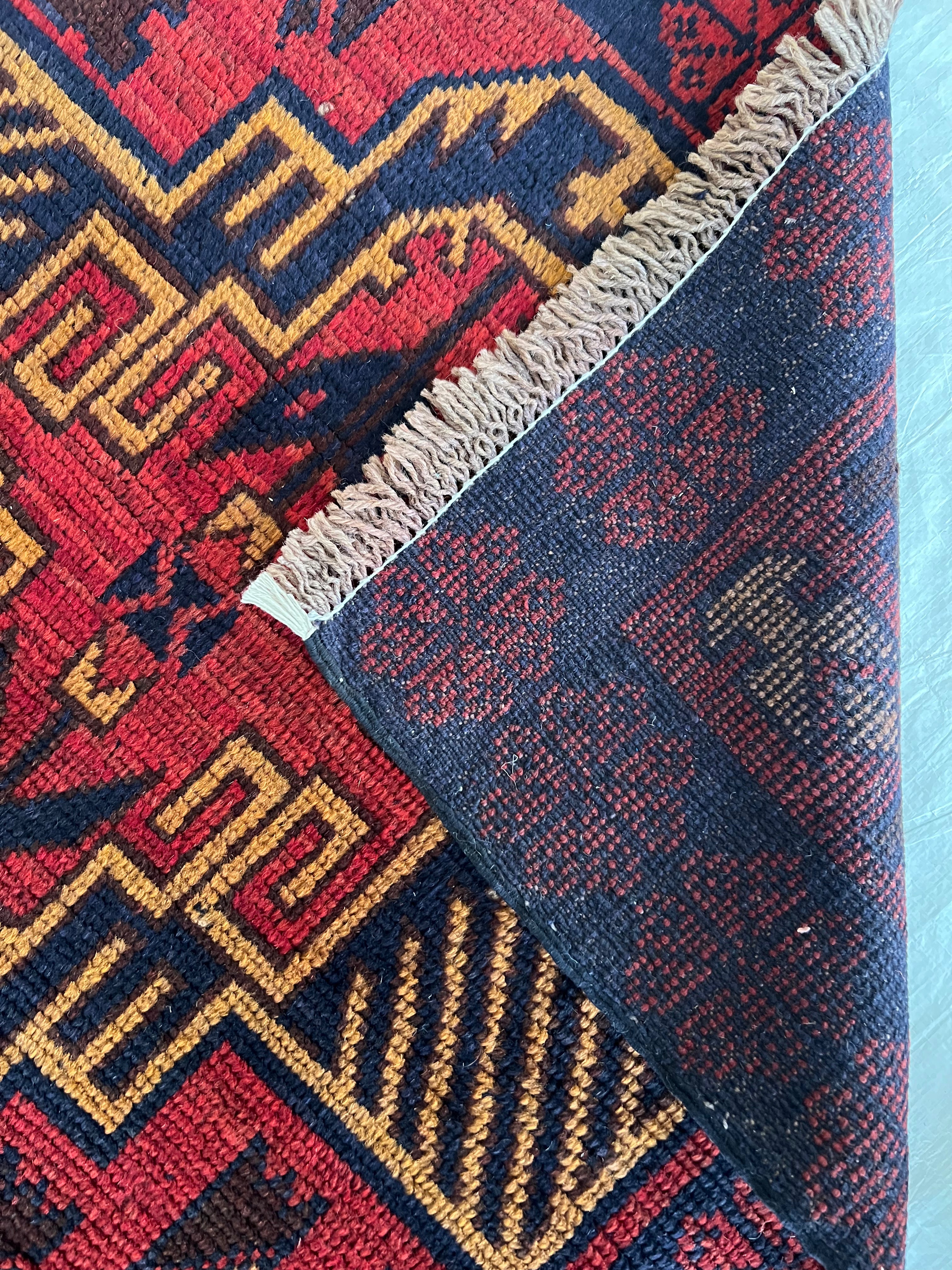 Afghani Runner runner size range tribal Red laid flat