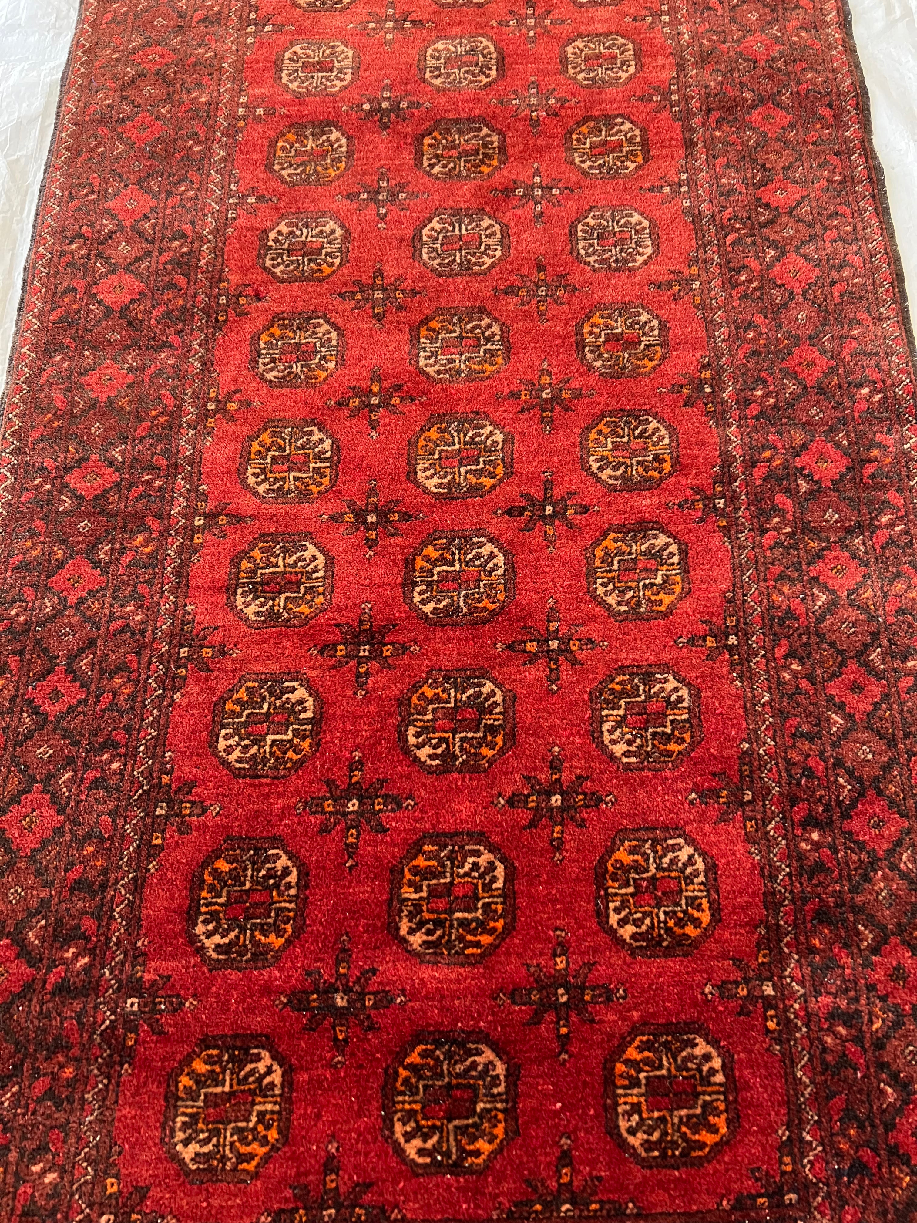 Afghani Runner runner size range tribal Red laid flat