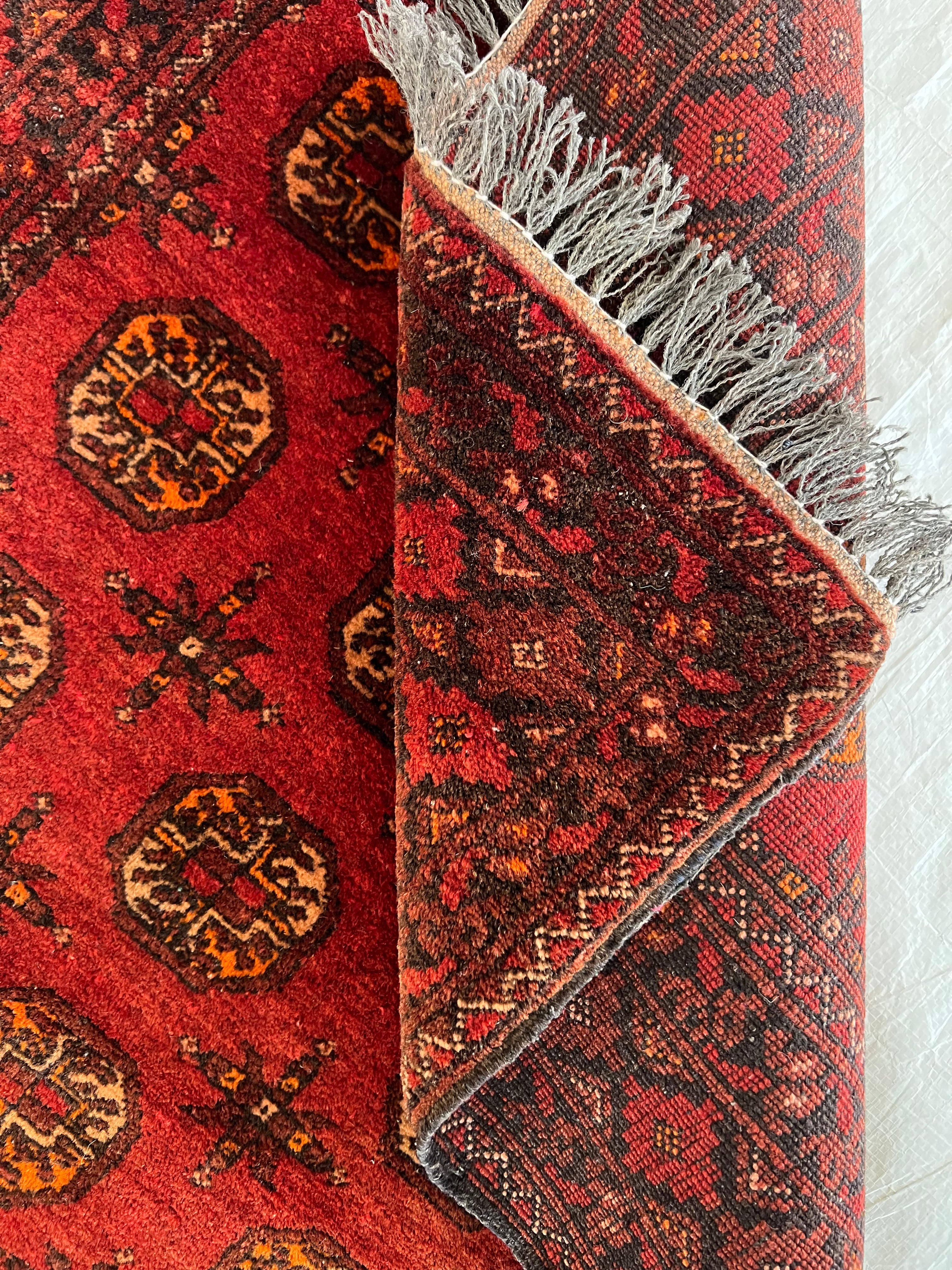 Afghani Runner runner size range tribal Red laid flat