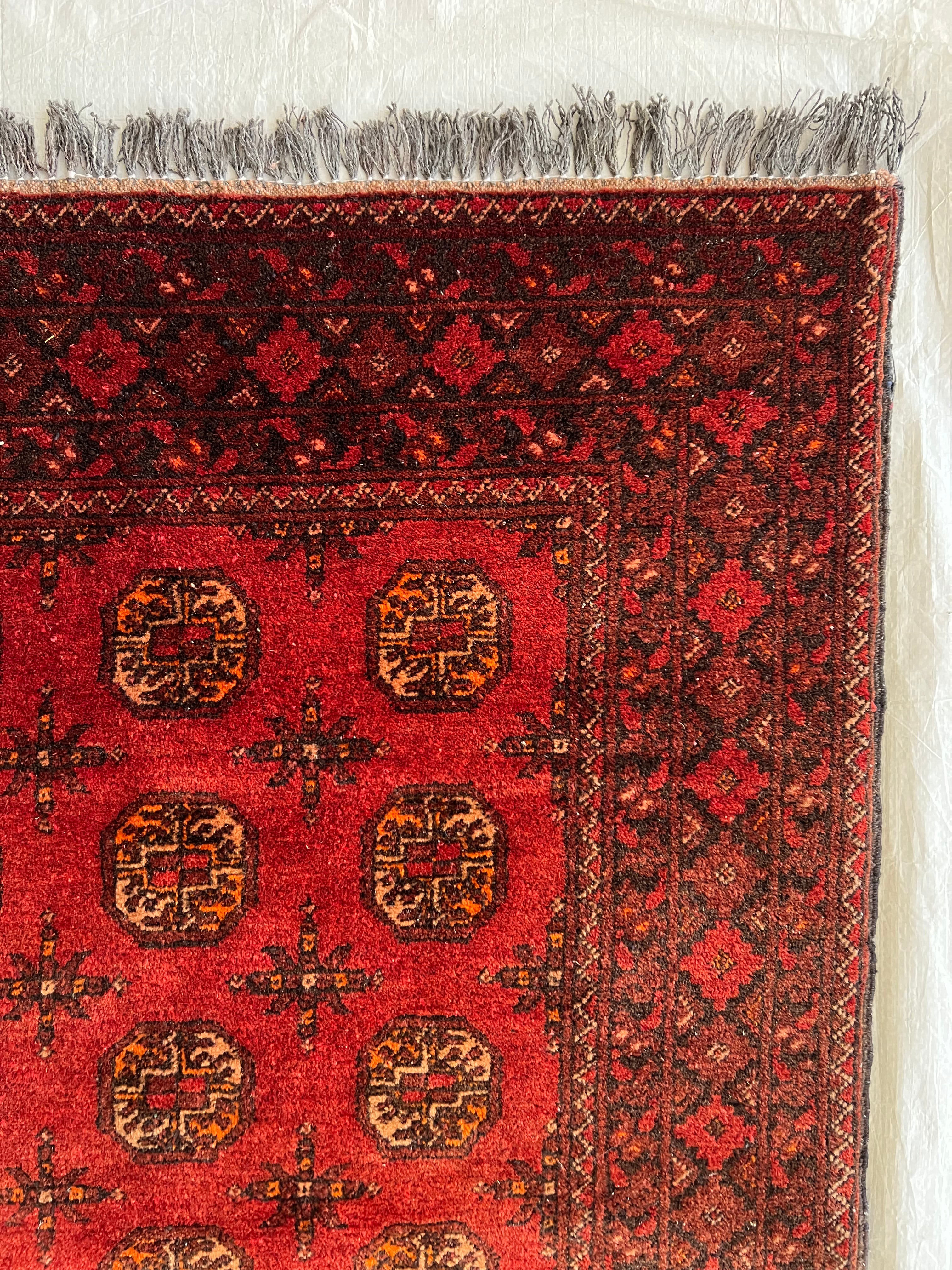 Afghani Runner runner size range tribal Red laid flat