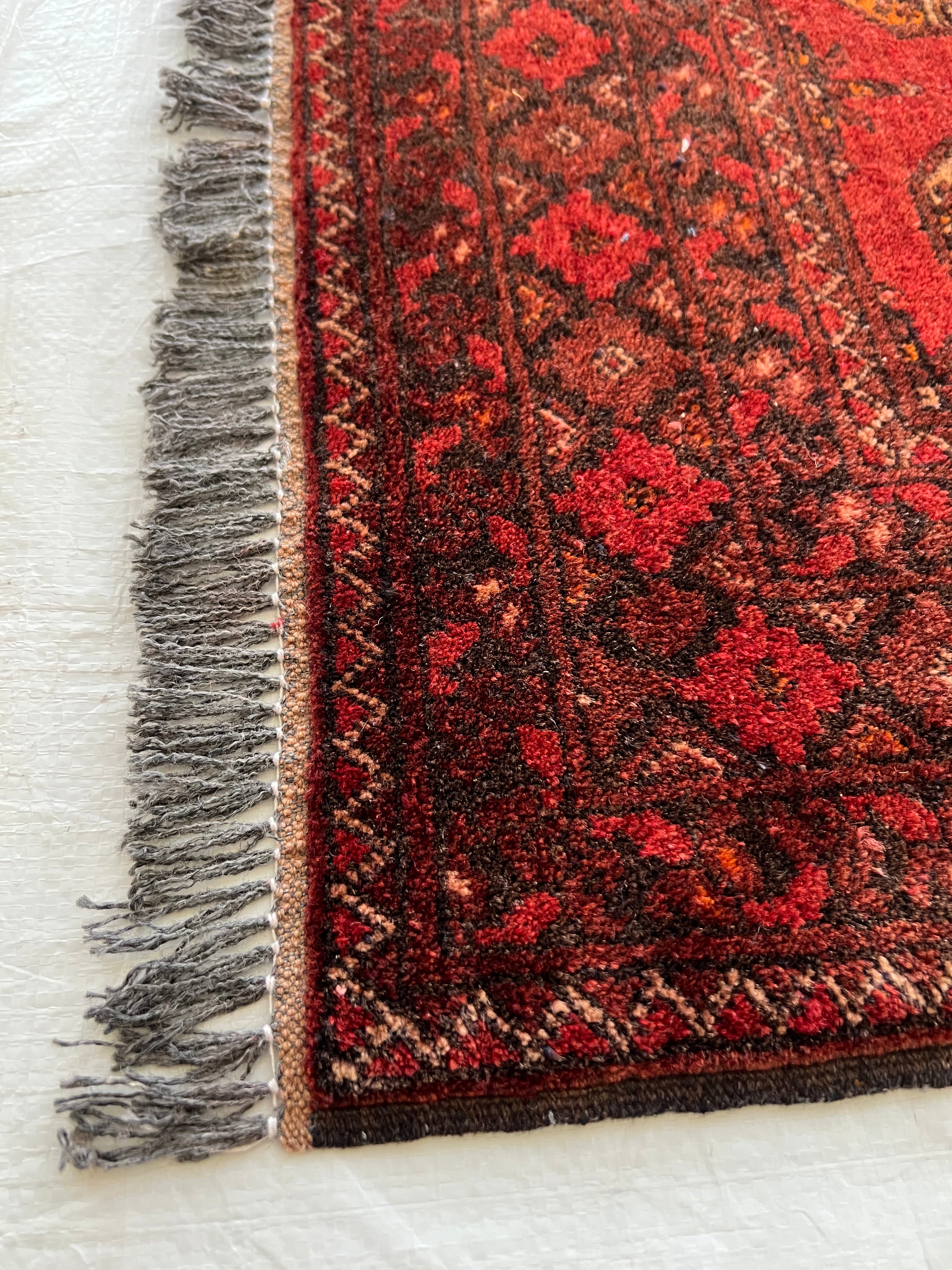 Afghani Runner runner size range tribal Red laid flat