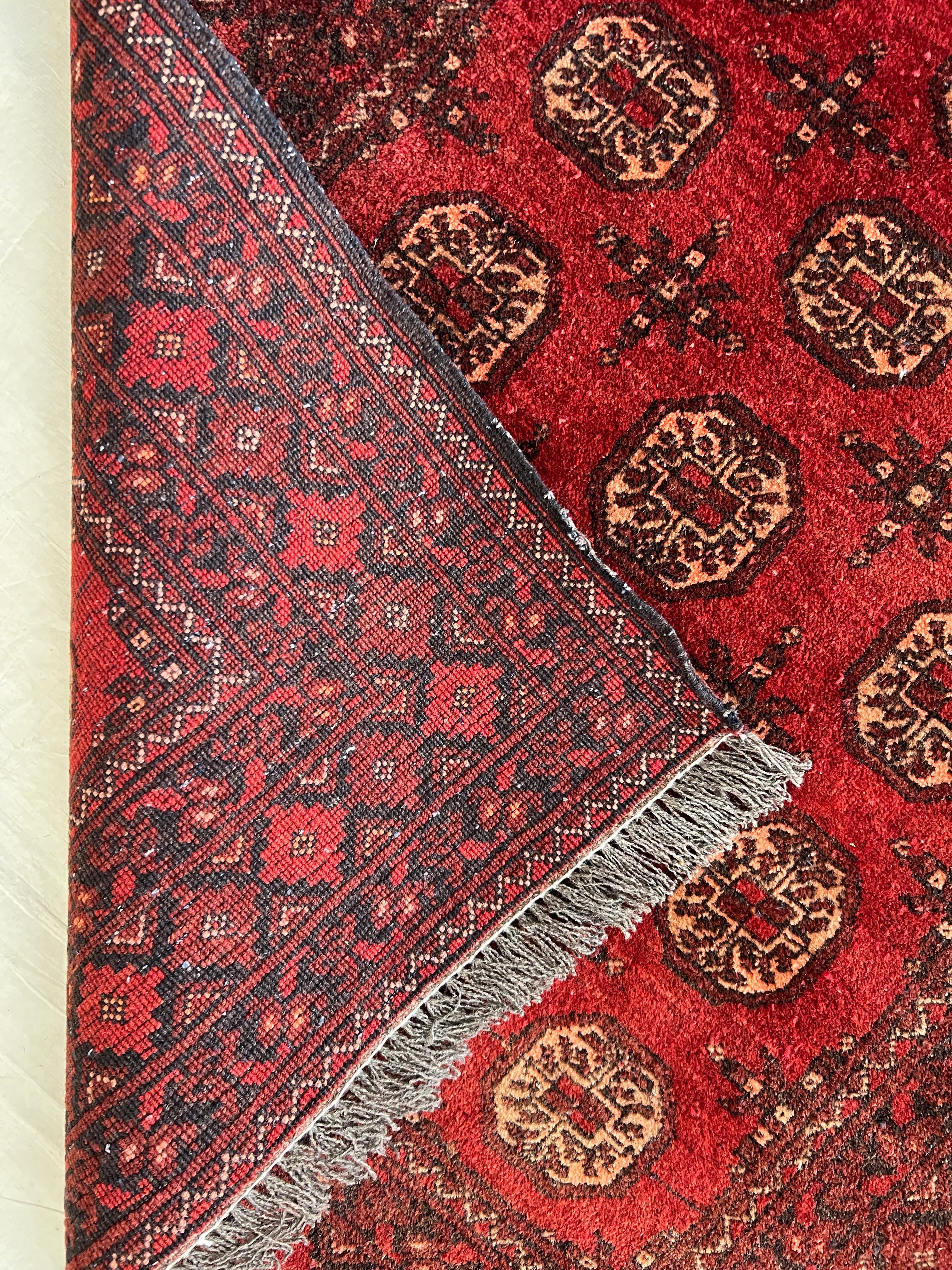 Afghani Runner runner size range tribal Red laid flat