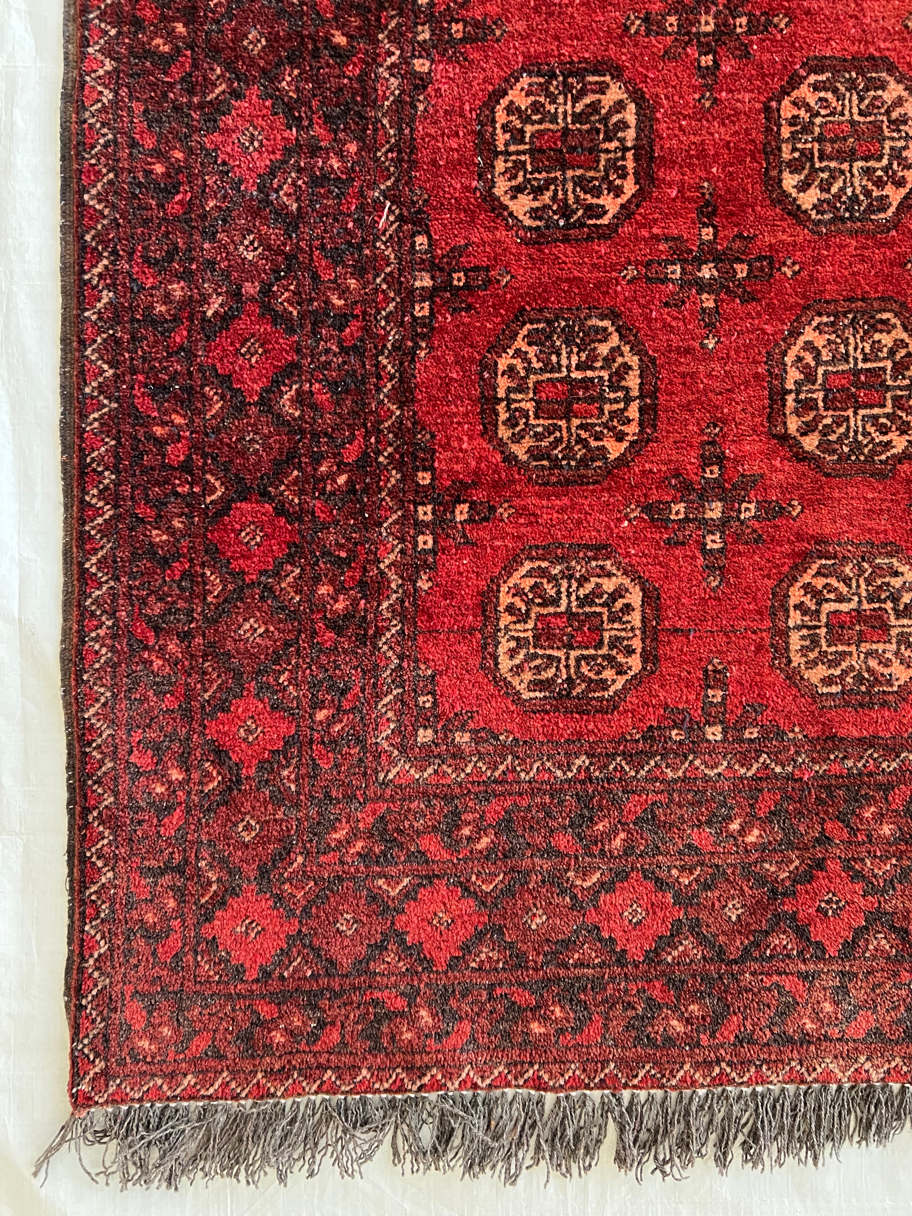 Afghani Runner runner size range tribal Red laid flat