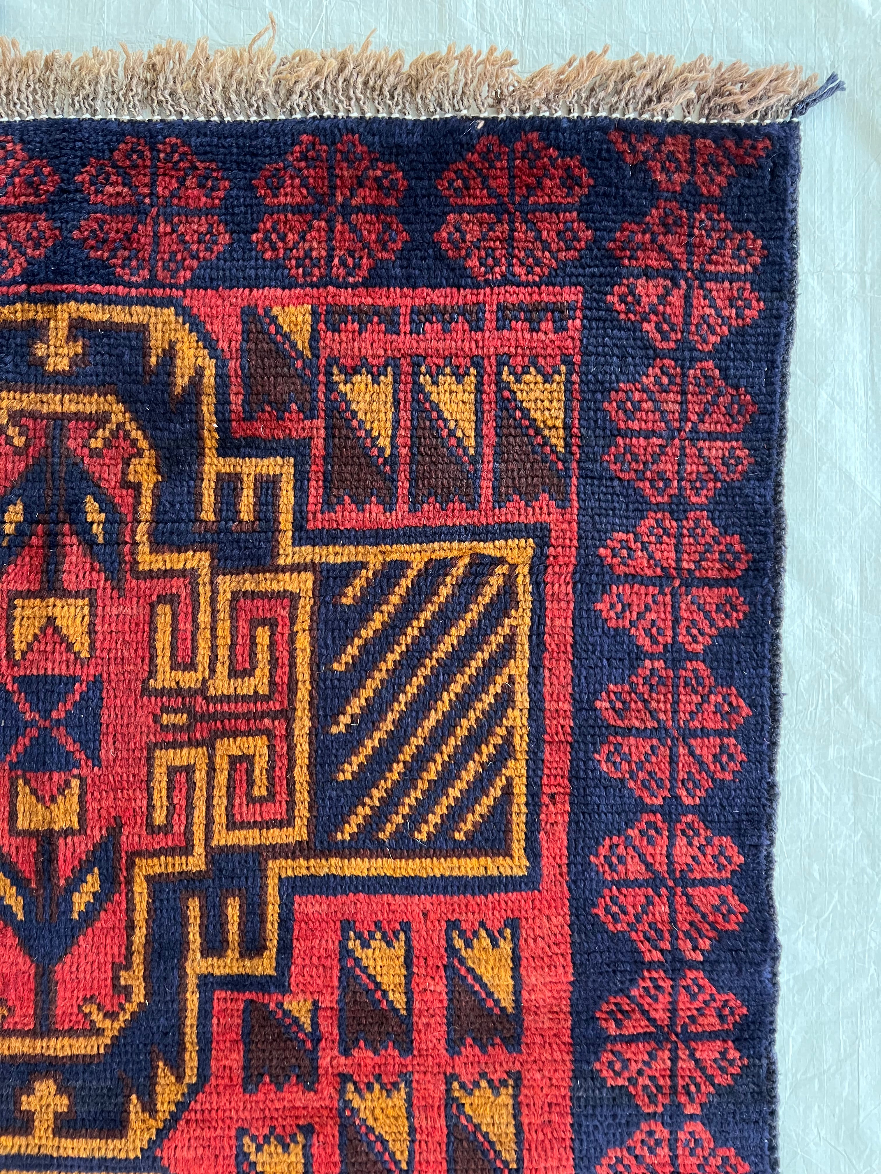 Afghani Runner runner size range tribal Red Blue laid flat