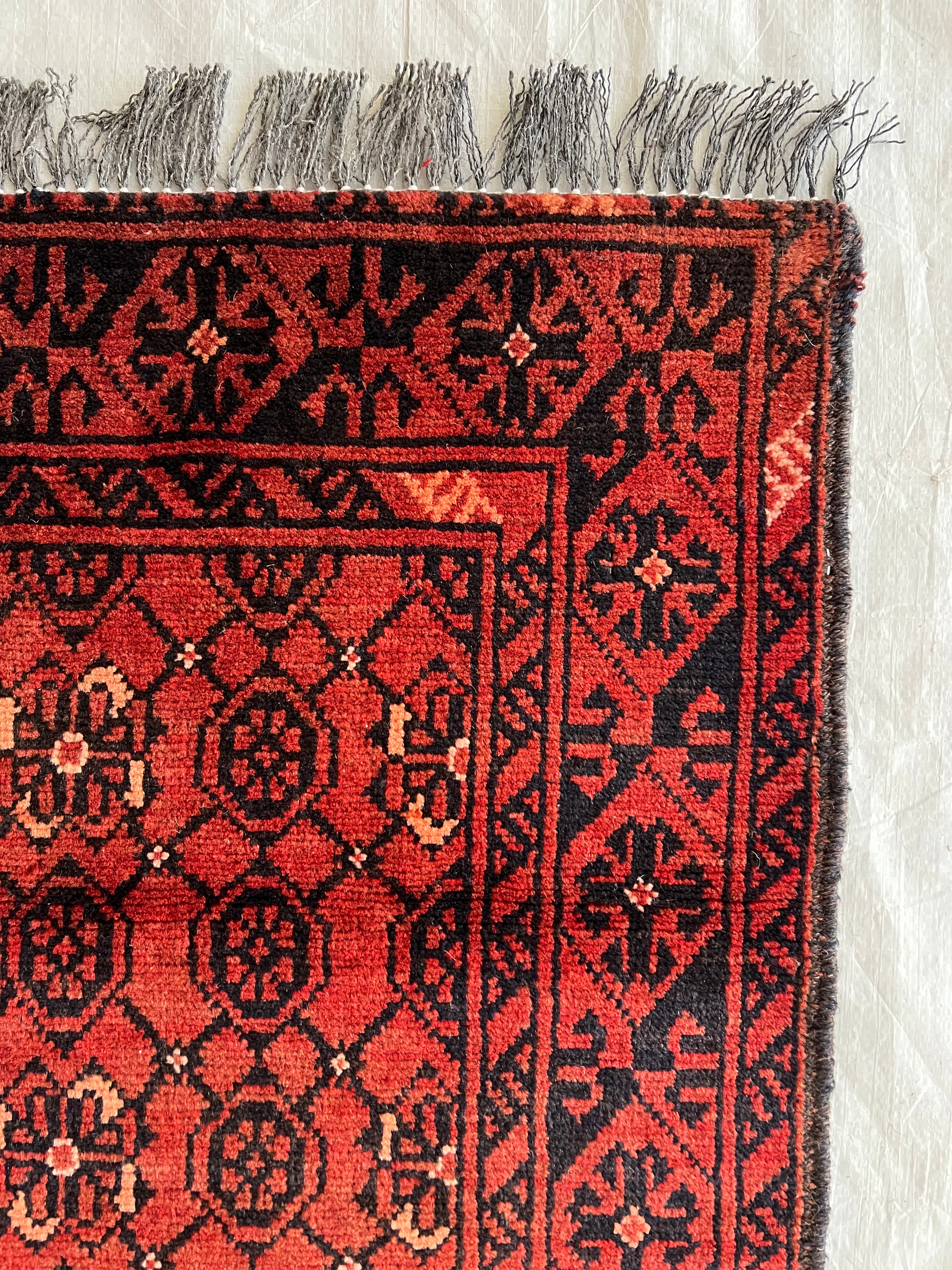 Afghani Runner runner size range tribal Red Blue laid flat
