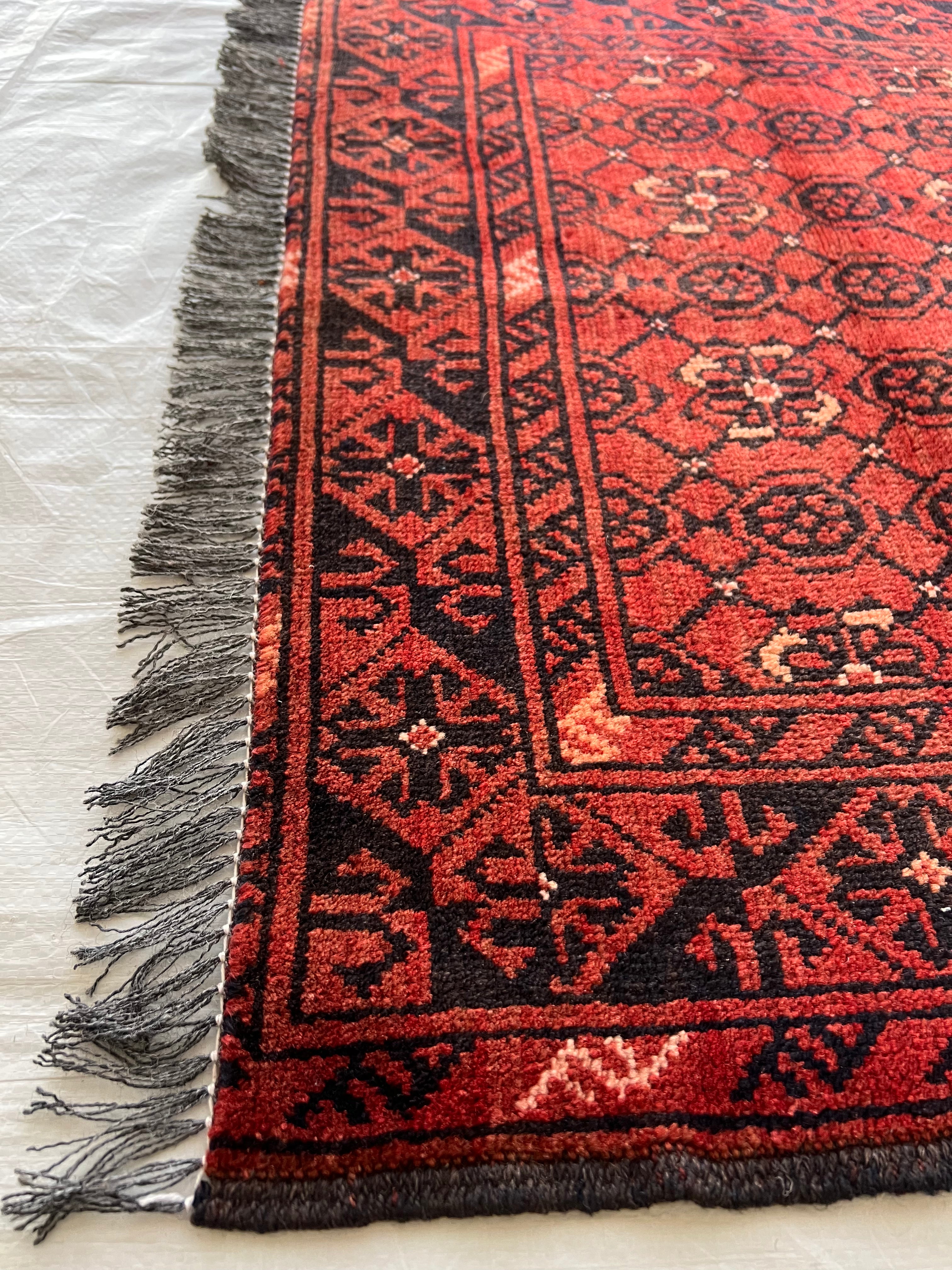Afghani Runner runner size range tribal Red Blue laid flat