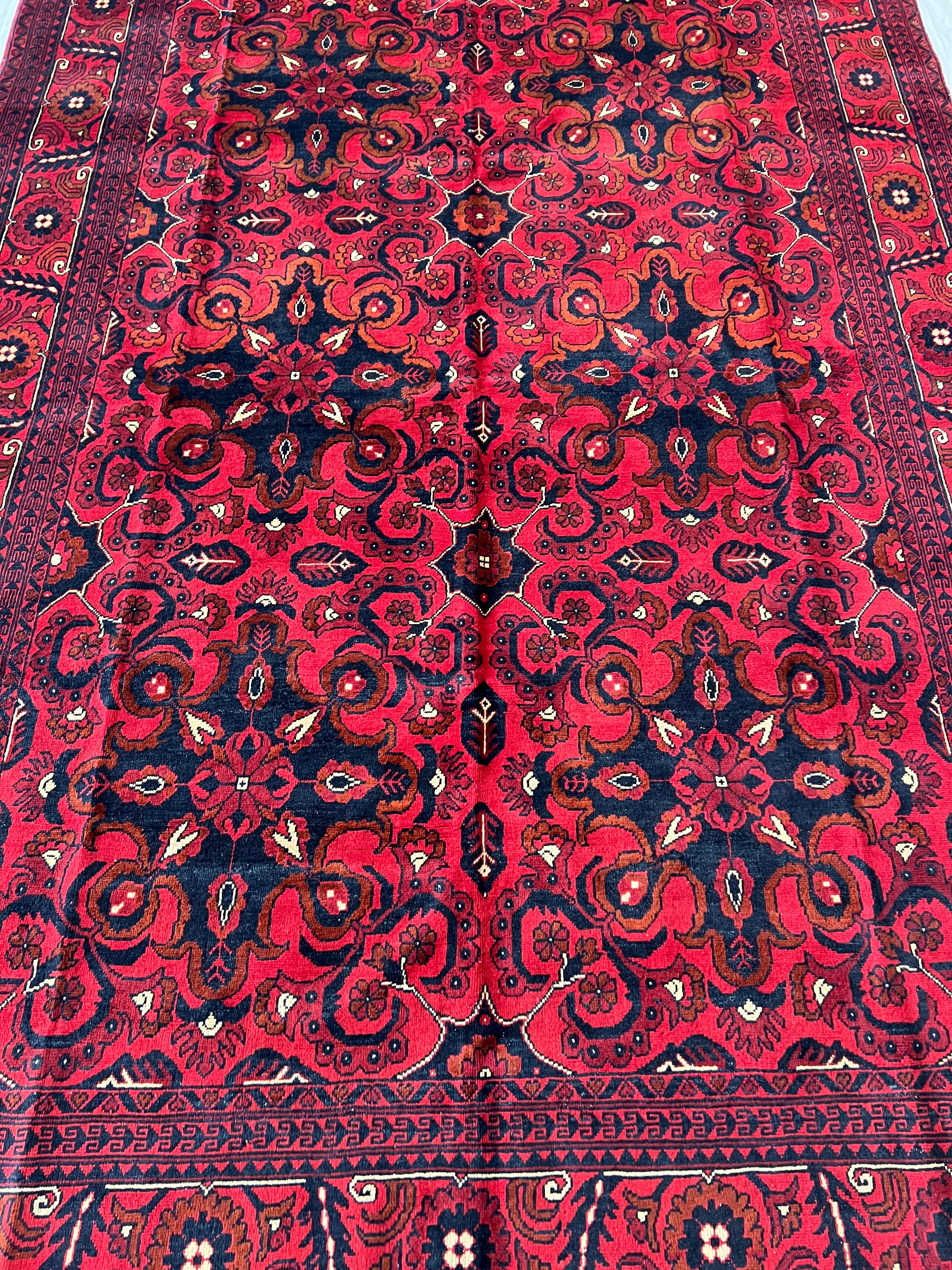 Afghani Rug 7x10 size range tribal Red laid flat