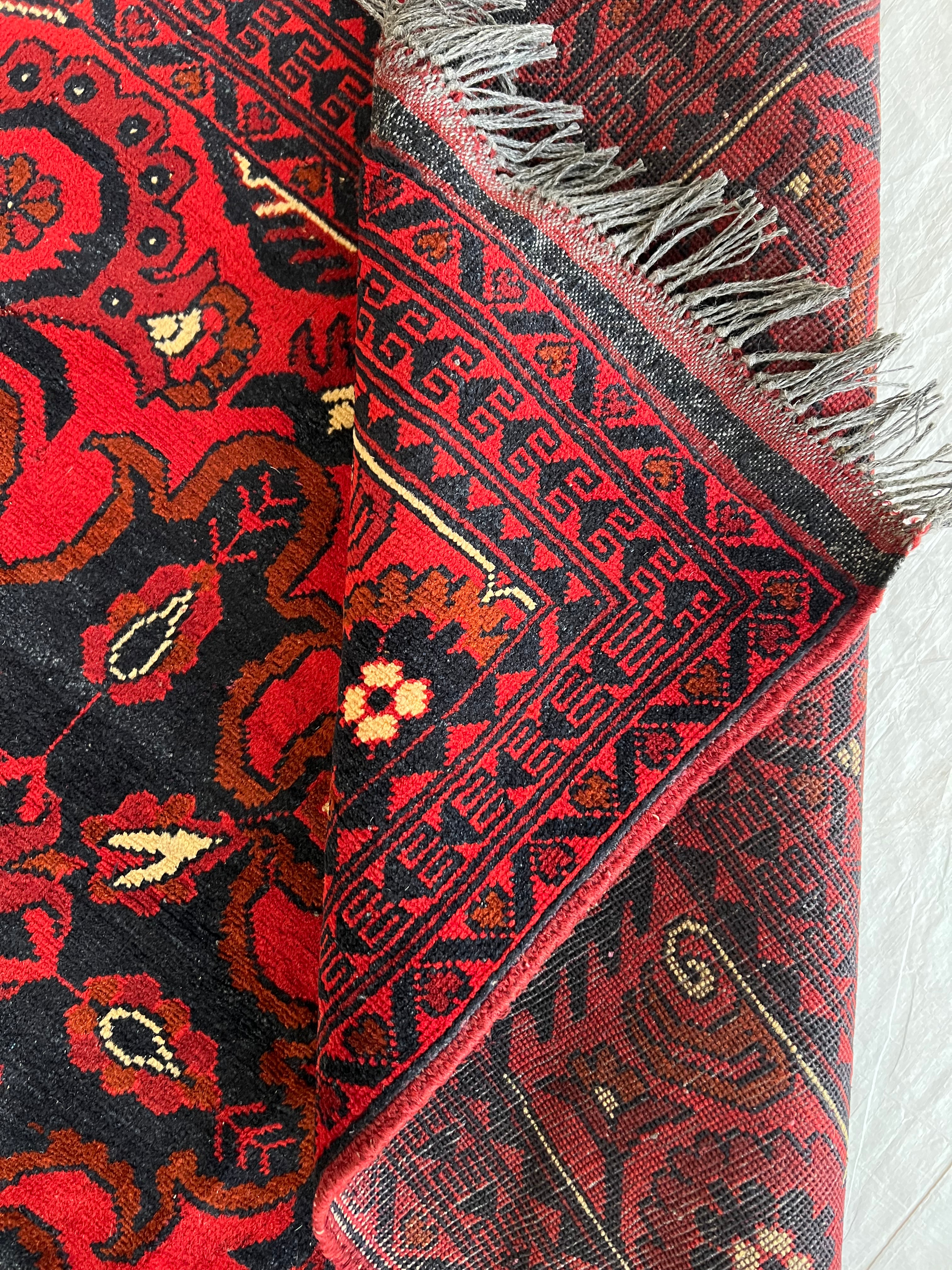 Afghani Rug 7x10 size range tribal Red laid flat