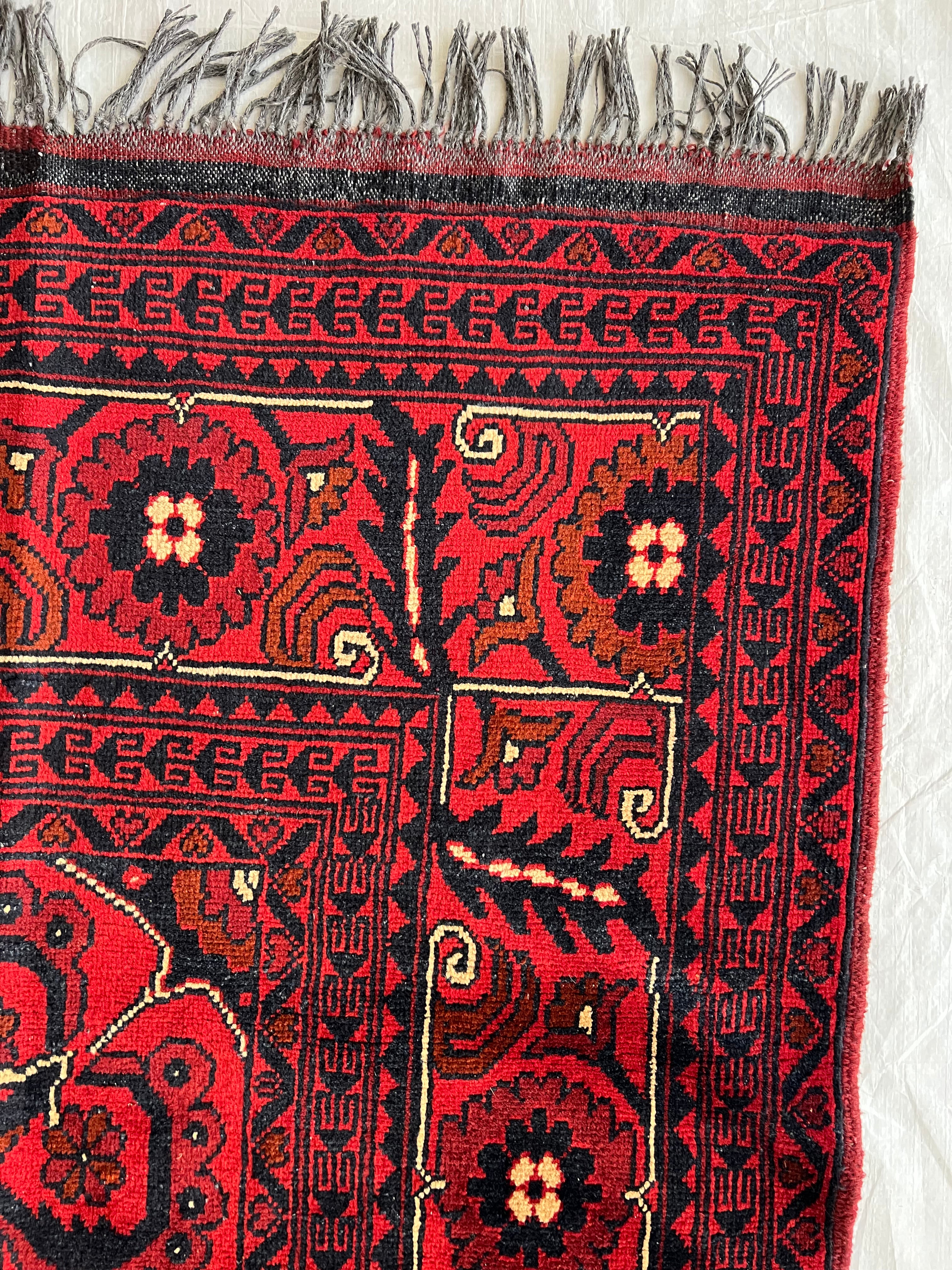 Afghani Rug 7x10 size range tribal Red laid flat