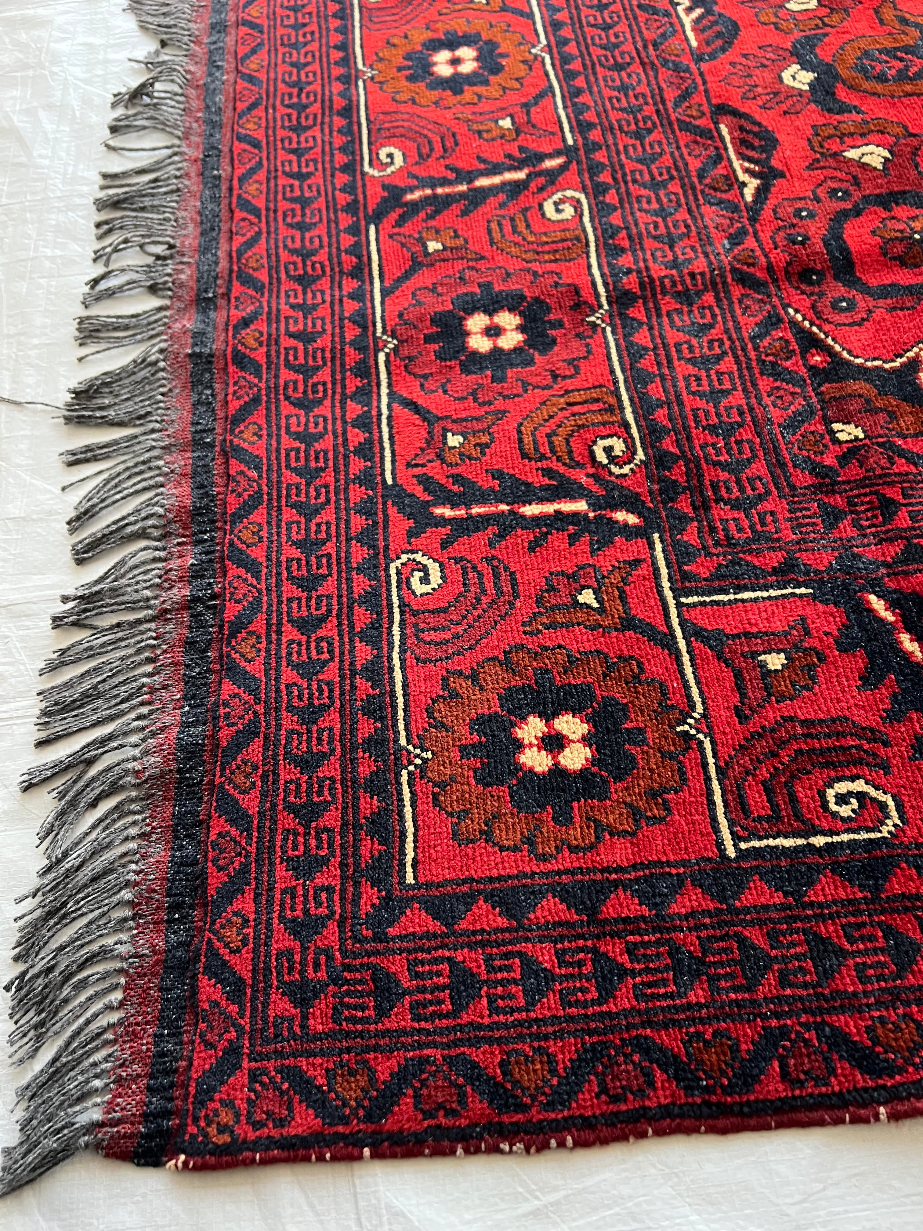 Afghani Rug 7x10 size range tribal Red laid flat
