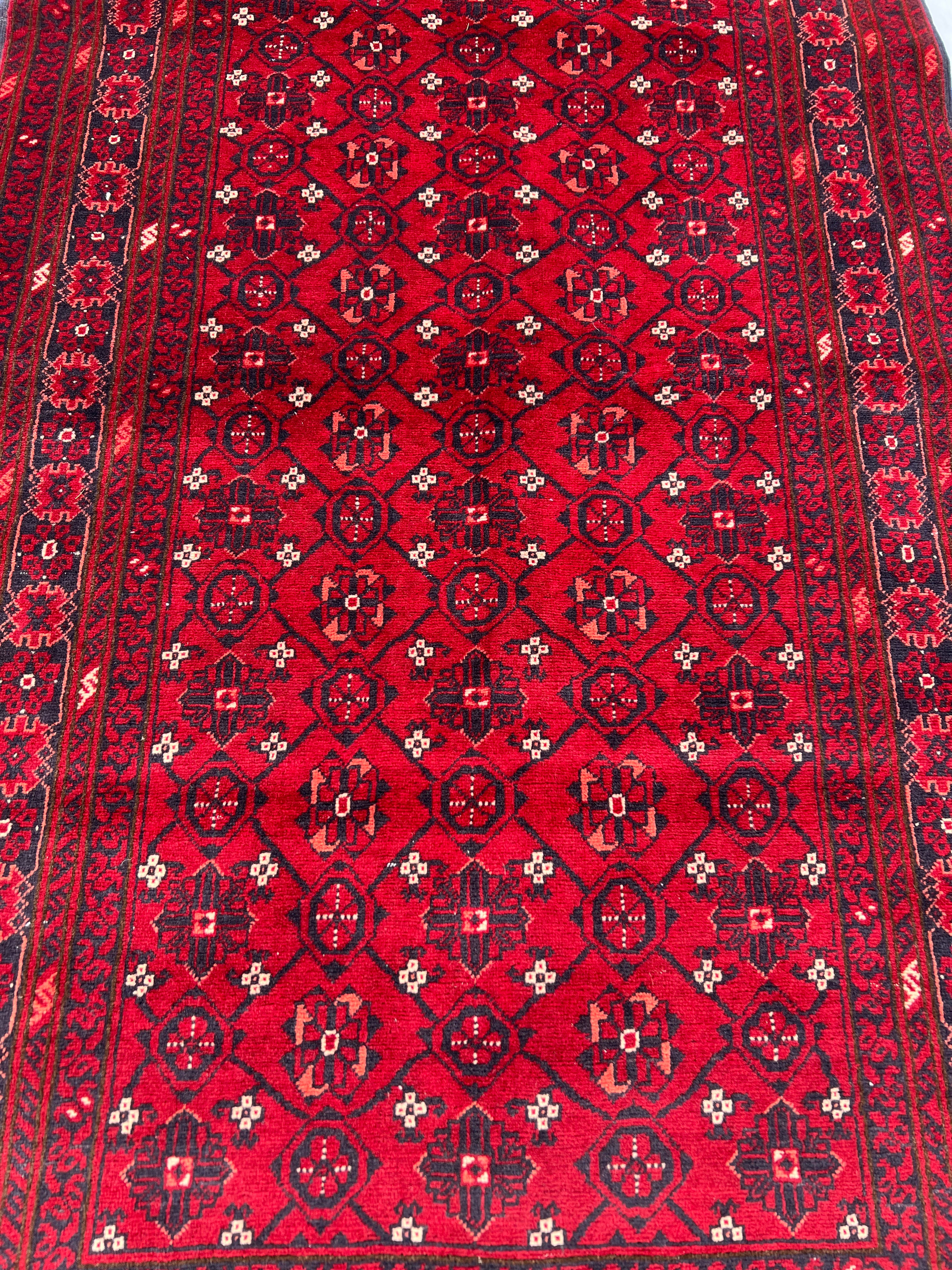 Afghani Runner runner size range tribal Red laid flat