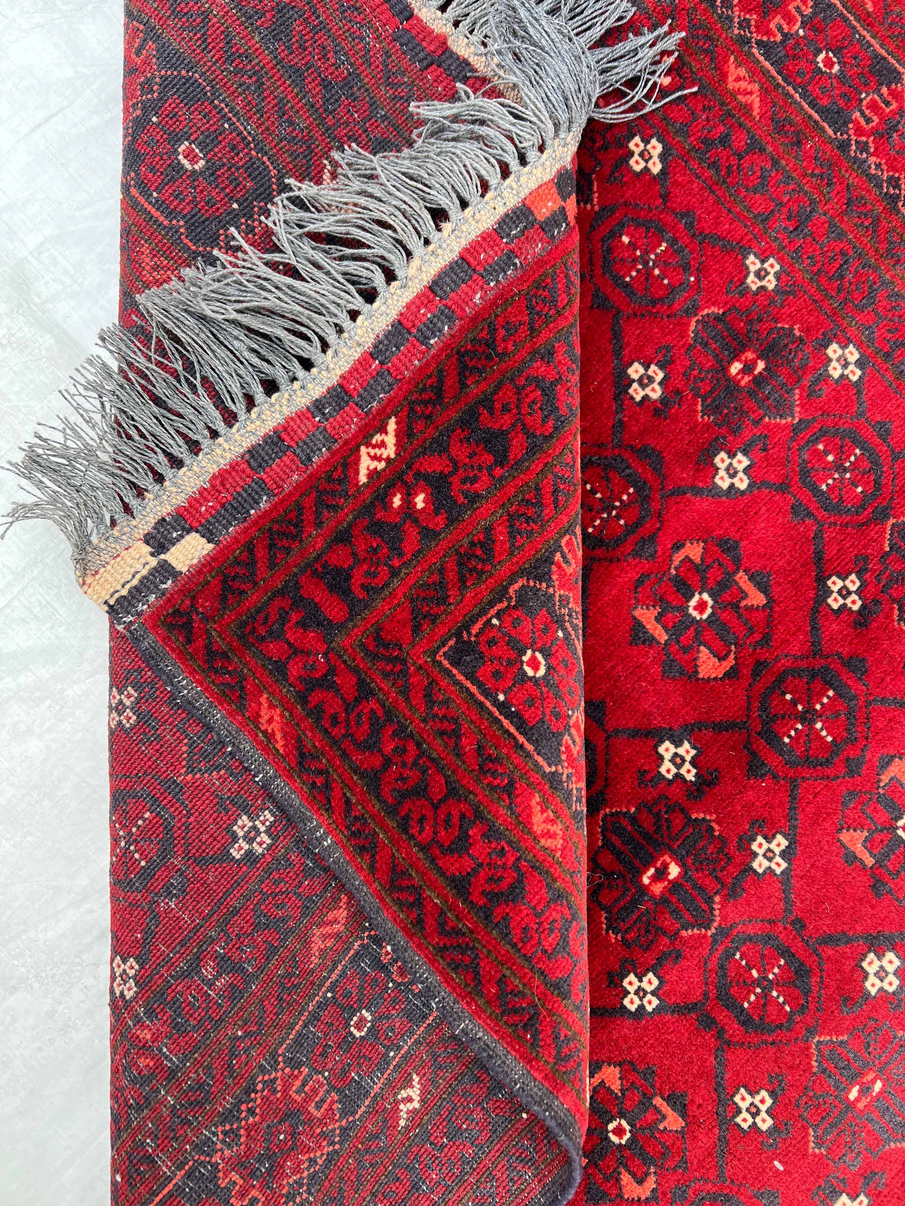 Afghani Runner runner size range tribal Red laid flat