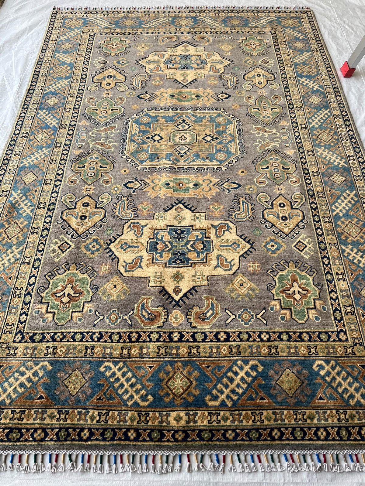 Kazak Rug 6x9 | Olive, Ivory & Navy | hand-knotted wool | full view, other end