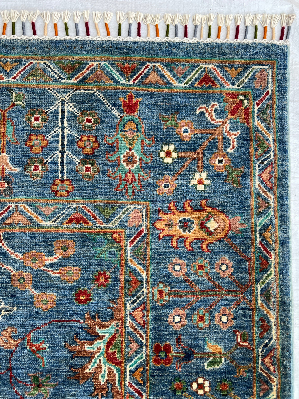 Chobi Rug 6x9 | hand-knotted wool | close-up of pile and border