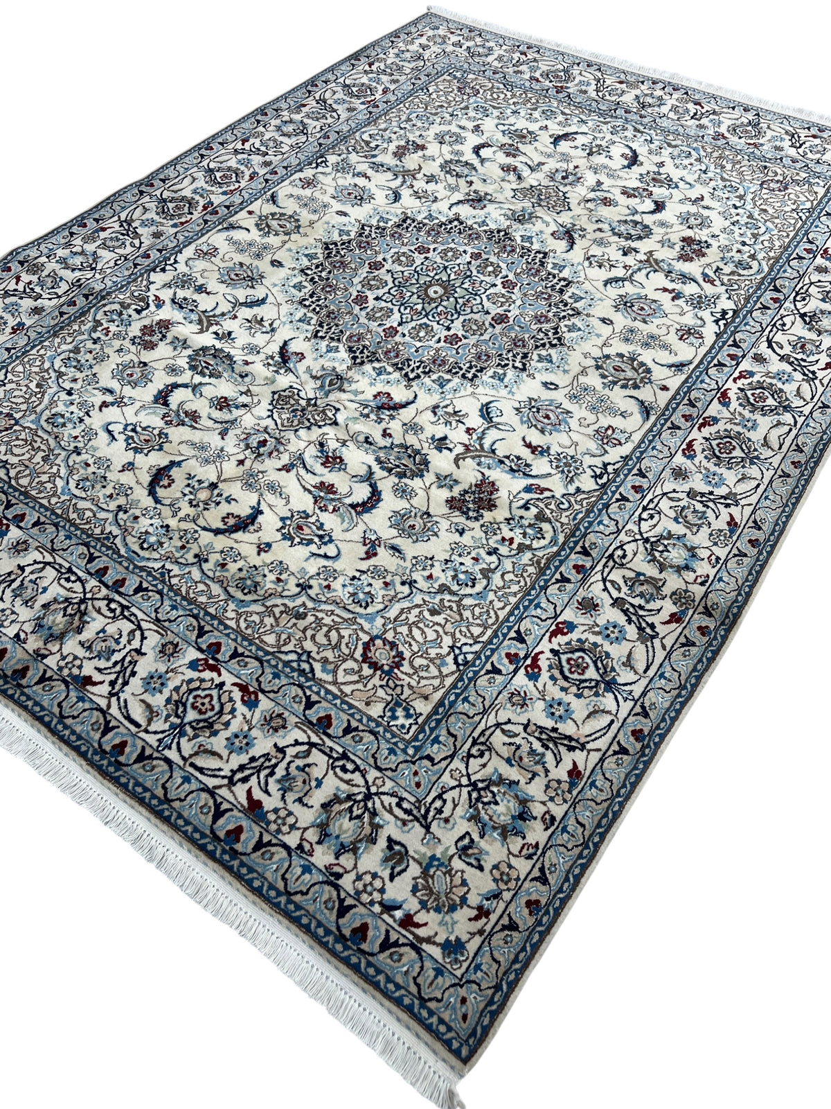 Nain Rug 7x9 | Ivory, Navy & Blue | hand-knotted wool | angled view