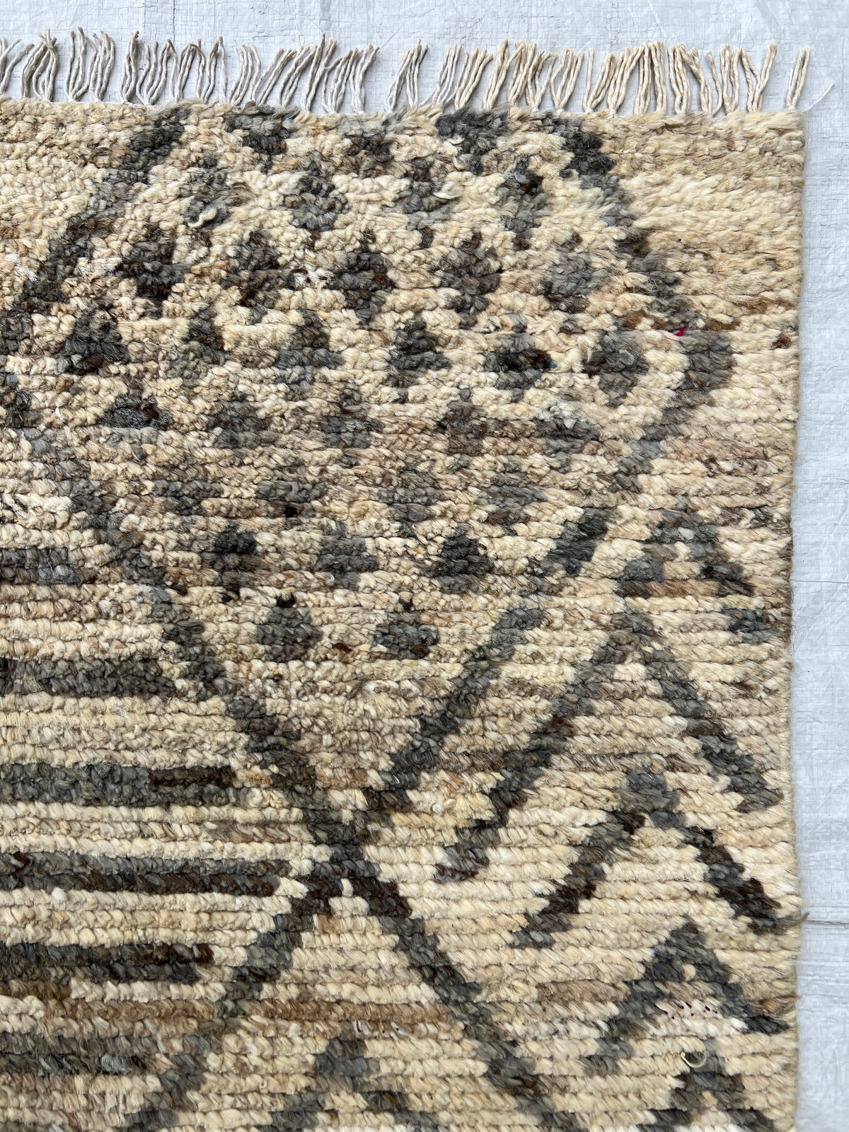 Moroccan-Style Rug 8x10 | Ivory & Charcoal | hand-knotted wool | close-up of pile and border