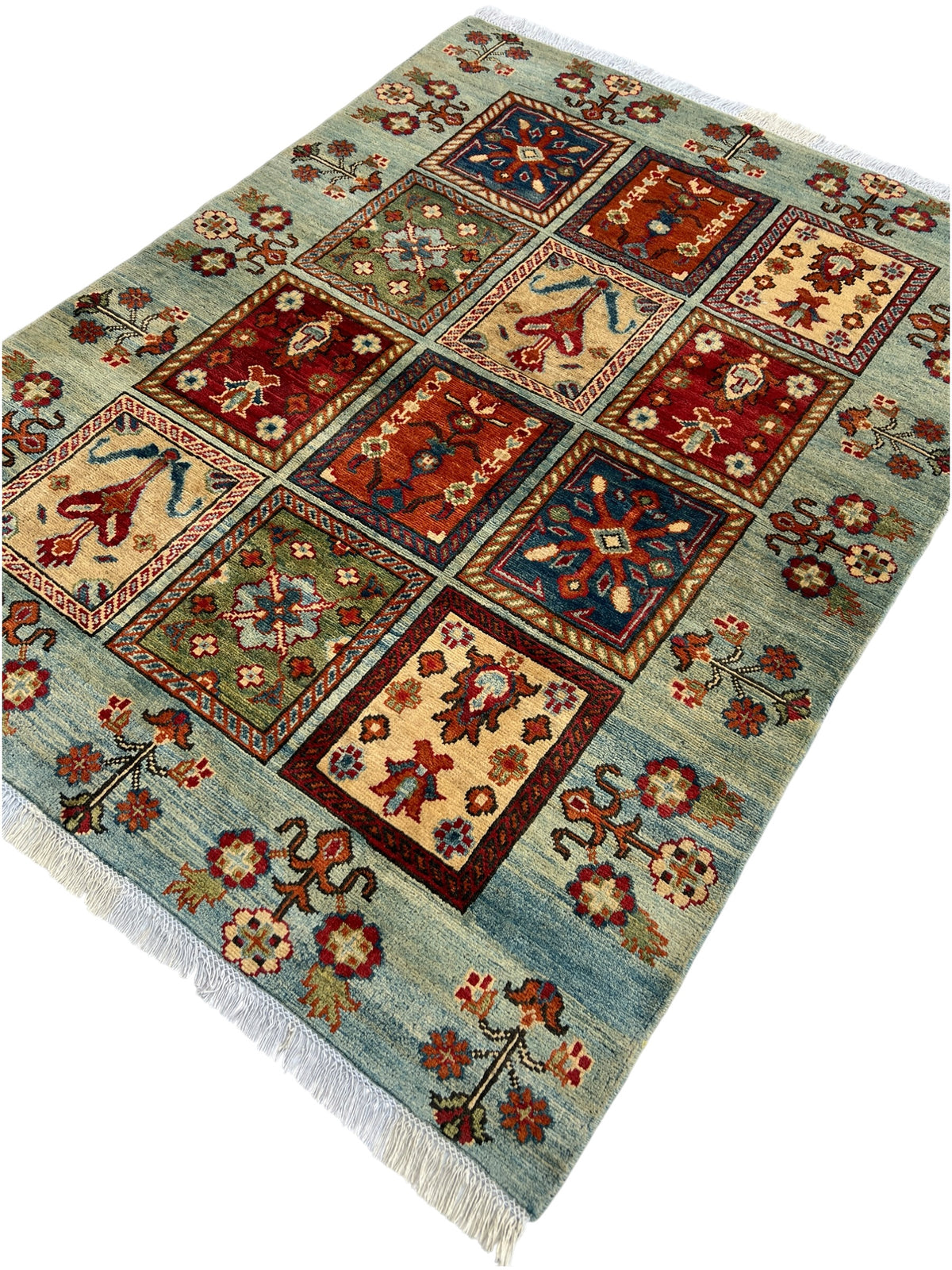 Kazak Rug 5x6 | Light Blue, Red & Gold | hand-knotted wool | angled view