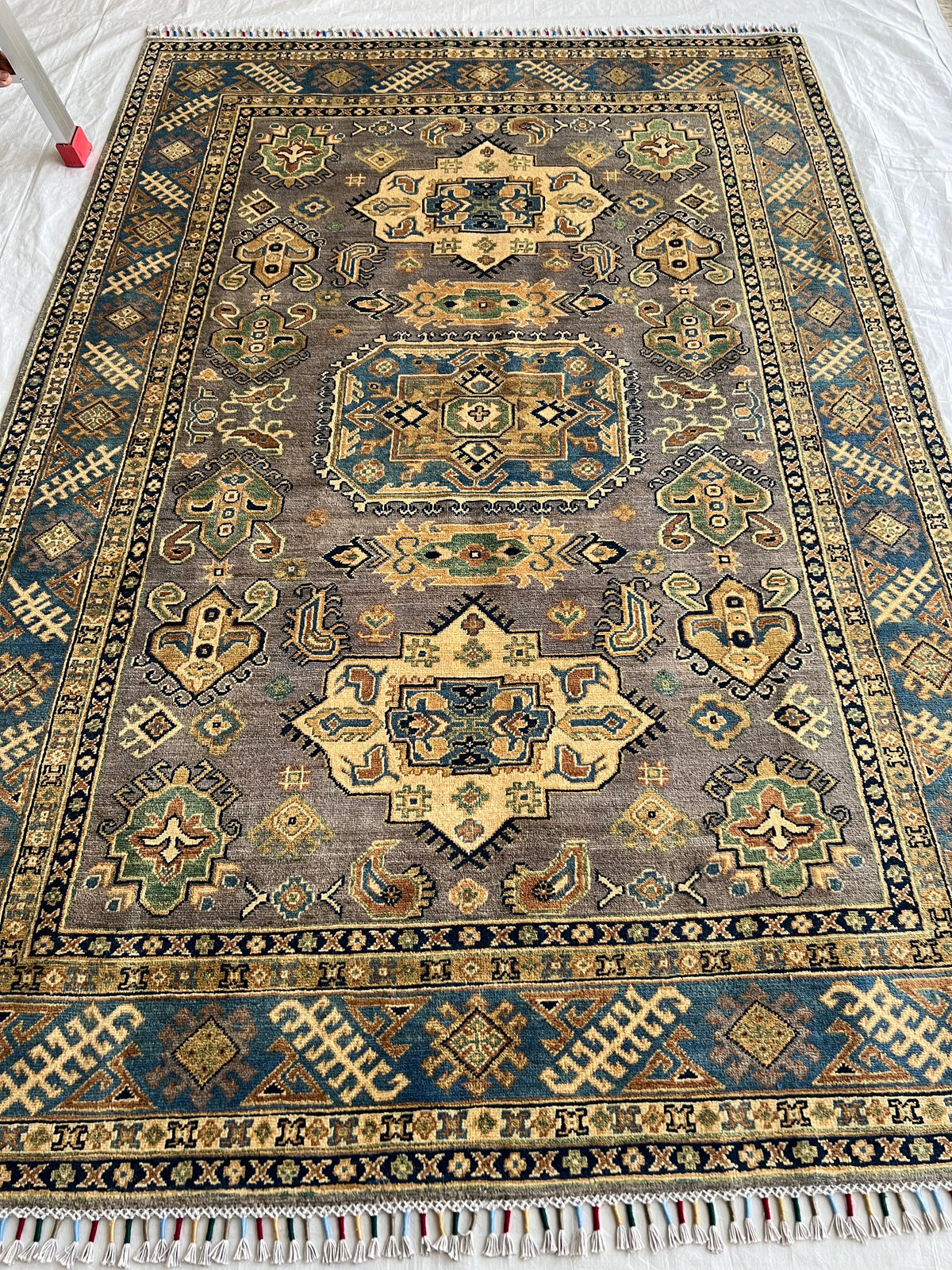 Kazak Rug 6x9 | Olive, Ivory & Navy | hand-knotted wool | full view, end