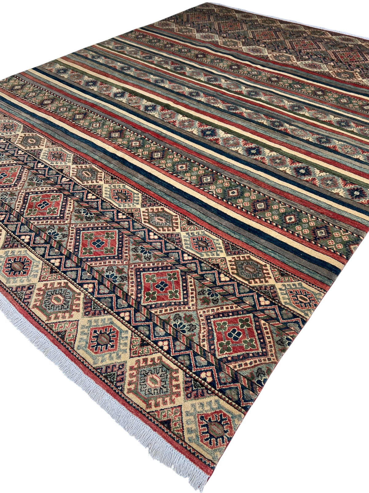 Kazak Rug 9x12 | Ivory, Red & Navy | hand-knotted wool | angled view