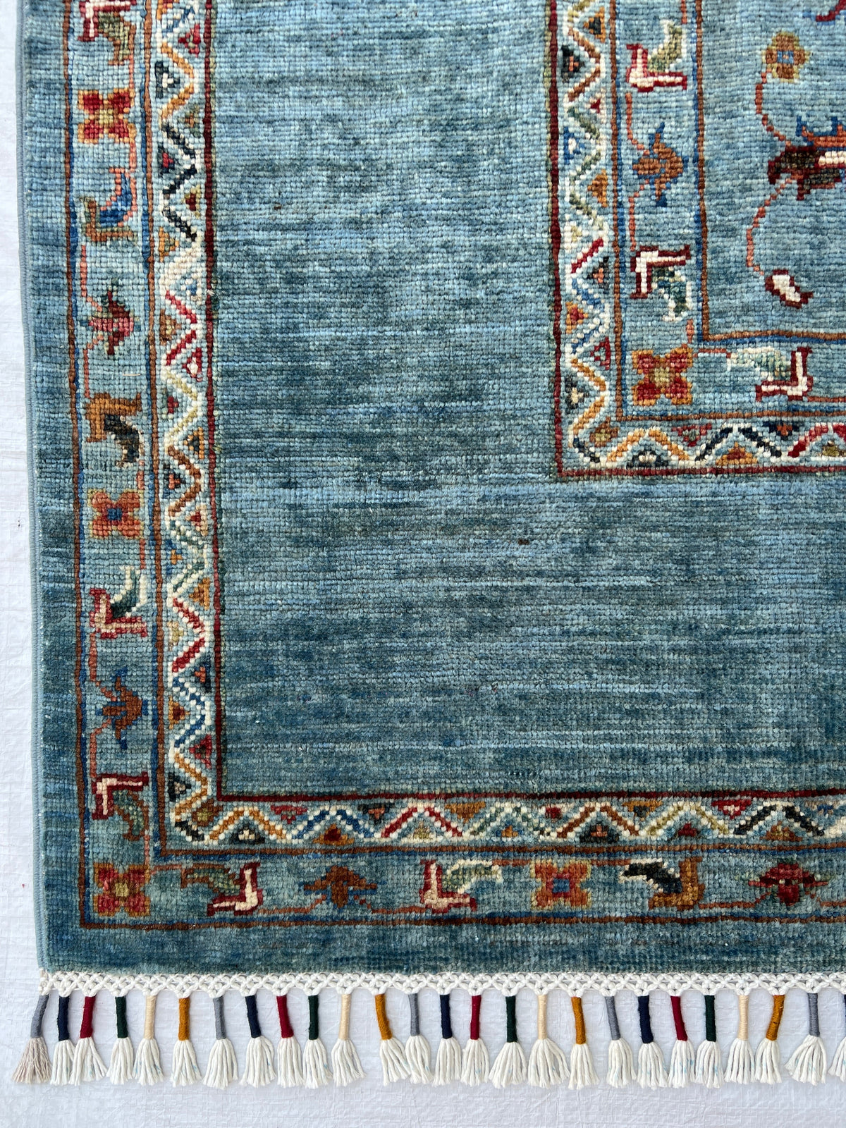 Chobi Rug 5x8 | hand-knotted wool | close-up of pile and border