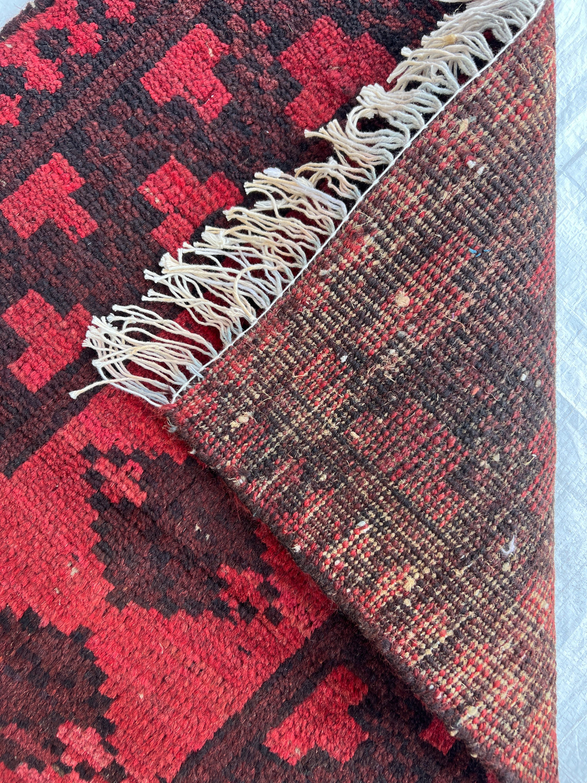 Baluch Rug 2x2 | Red, Brick & Charcoal | hand-knotted wool | back of rug, knot detail