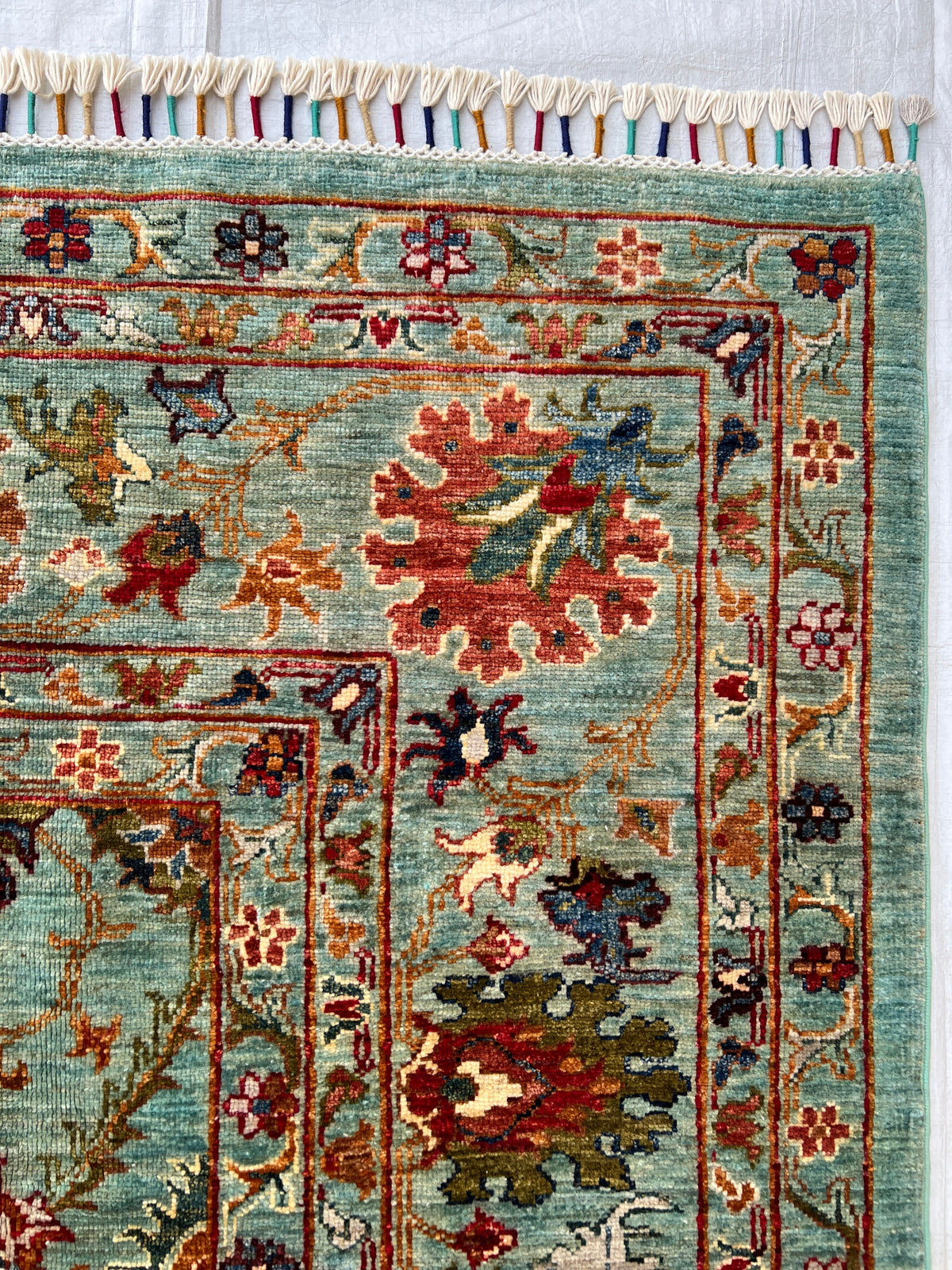 Chobi Rug 7x10 | hand-knotted wool | close-up of pile and border