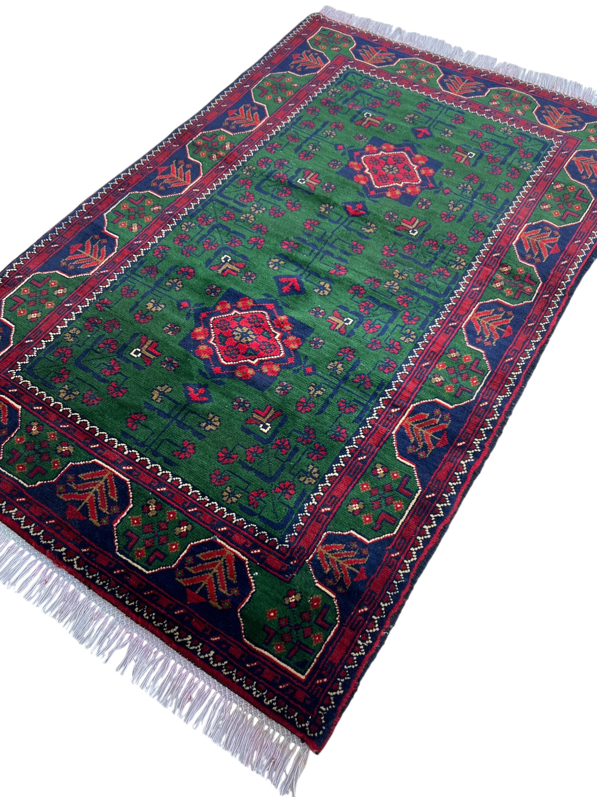 Bukhara Rug 3x5 | Green, Navy & Red | hand-knotted wool | angled view