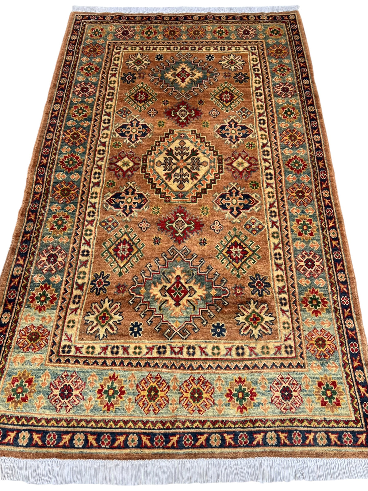 Kazak Rug 4x6 | Peach, Navy & Ivory | hand-knotted wool | full view, end