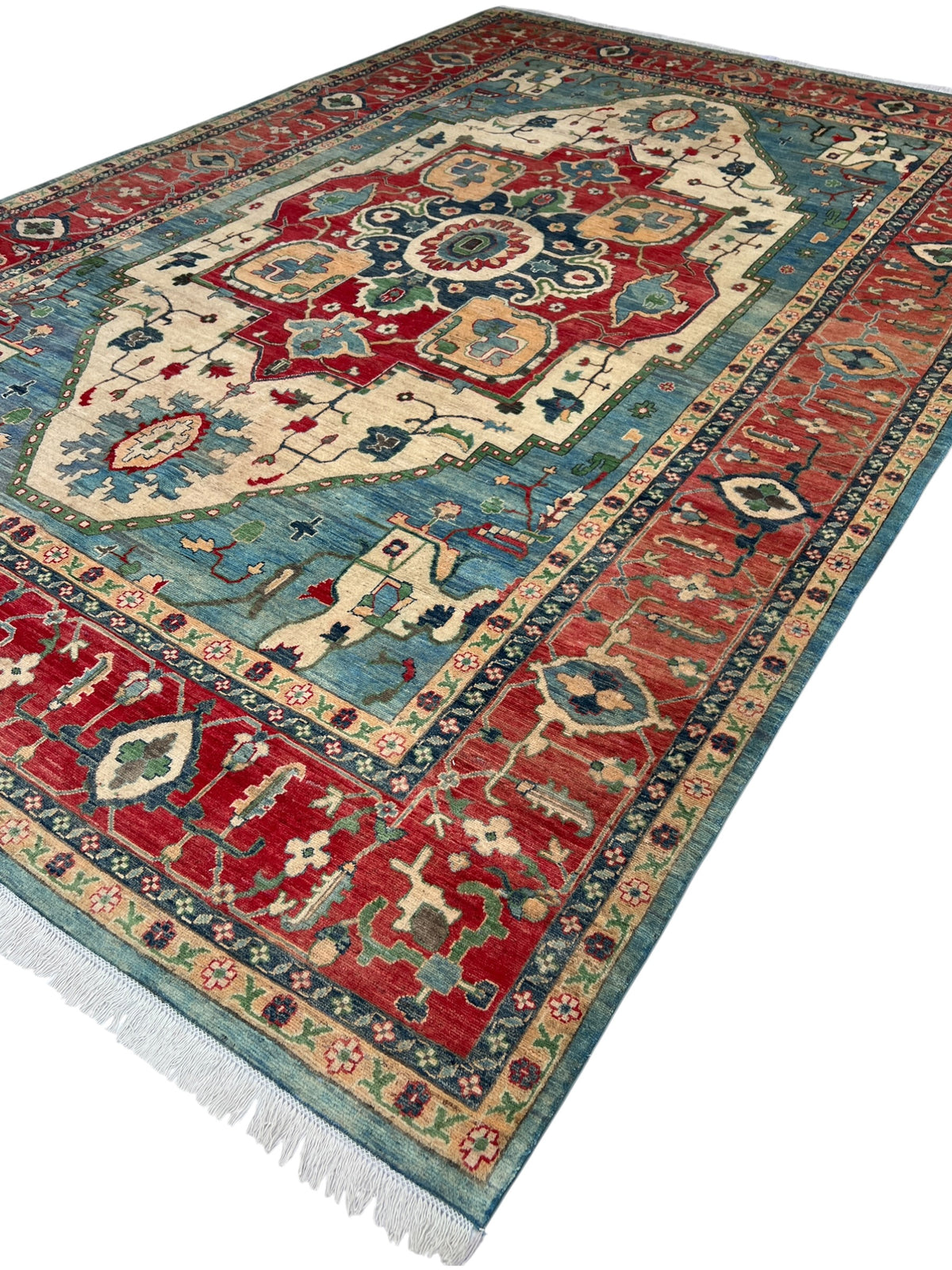 Kazak Rug 9x14 | Teal, Ivory & Red | hand-knotted wool | angled view