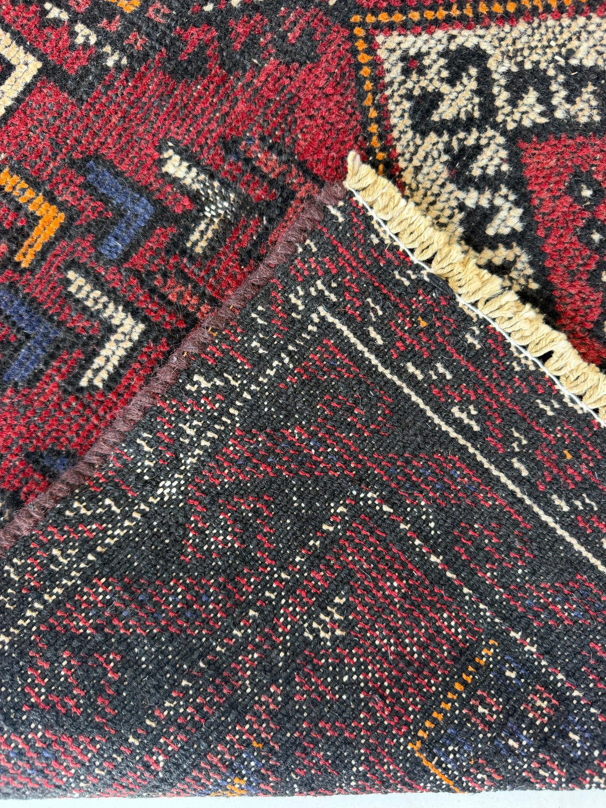 Back of vintage Baluch rug | hand-knotted weave | knot detail