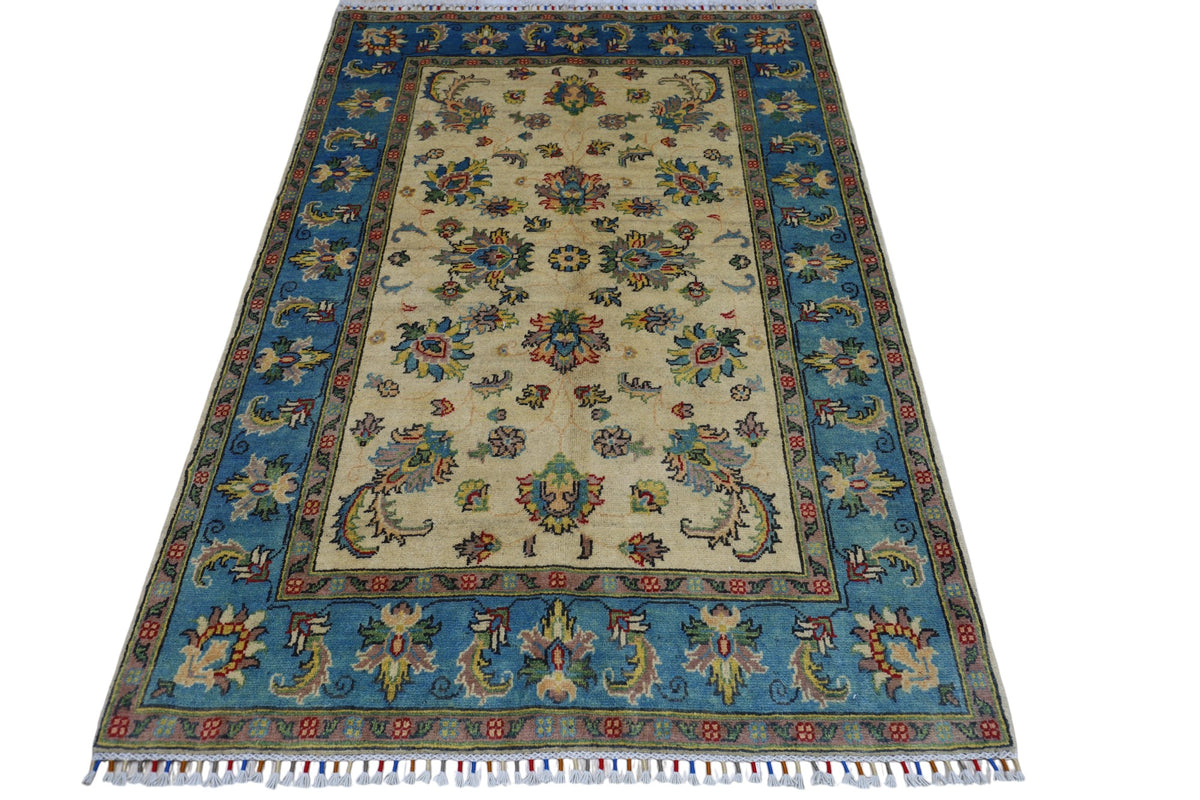 Afghani Rug 5x8 size range tribal Blue Cream laid flat