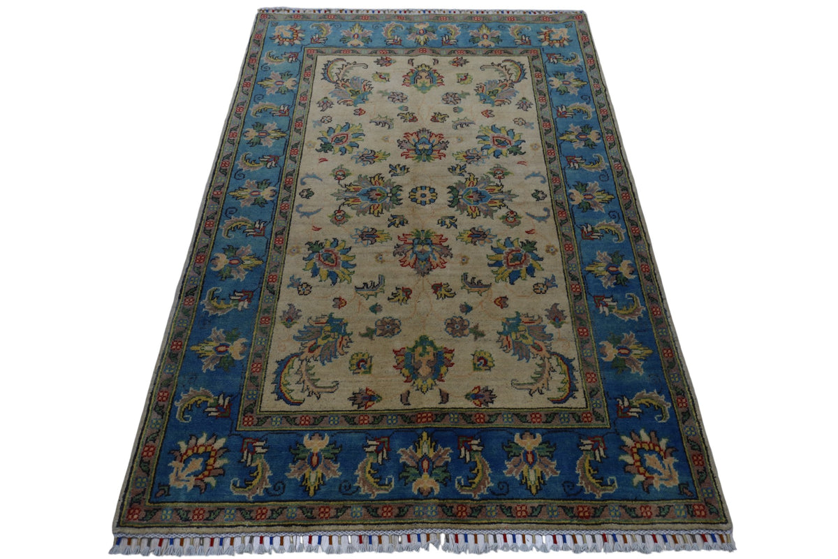 Afghani Rug 5x8 size range tribal Blue Cream laid flat