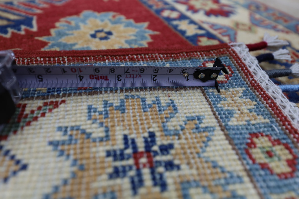 Afghani Runner runner size range tribal Red Cream laid flat