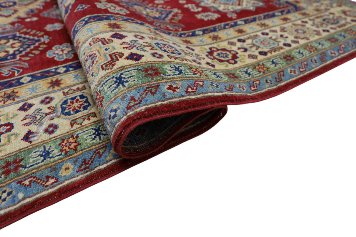 Afghani Rug 7x10 size range tribal Red Cream laid flat