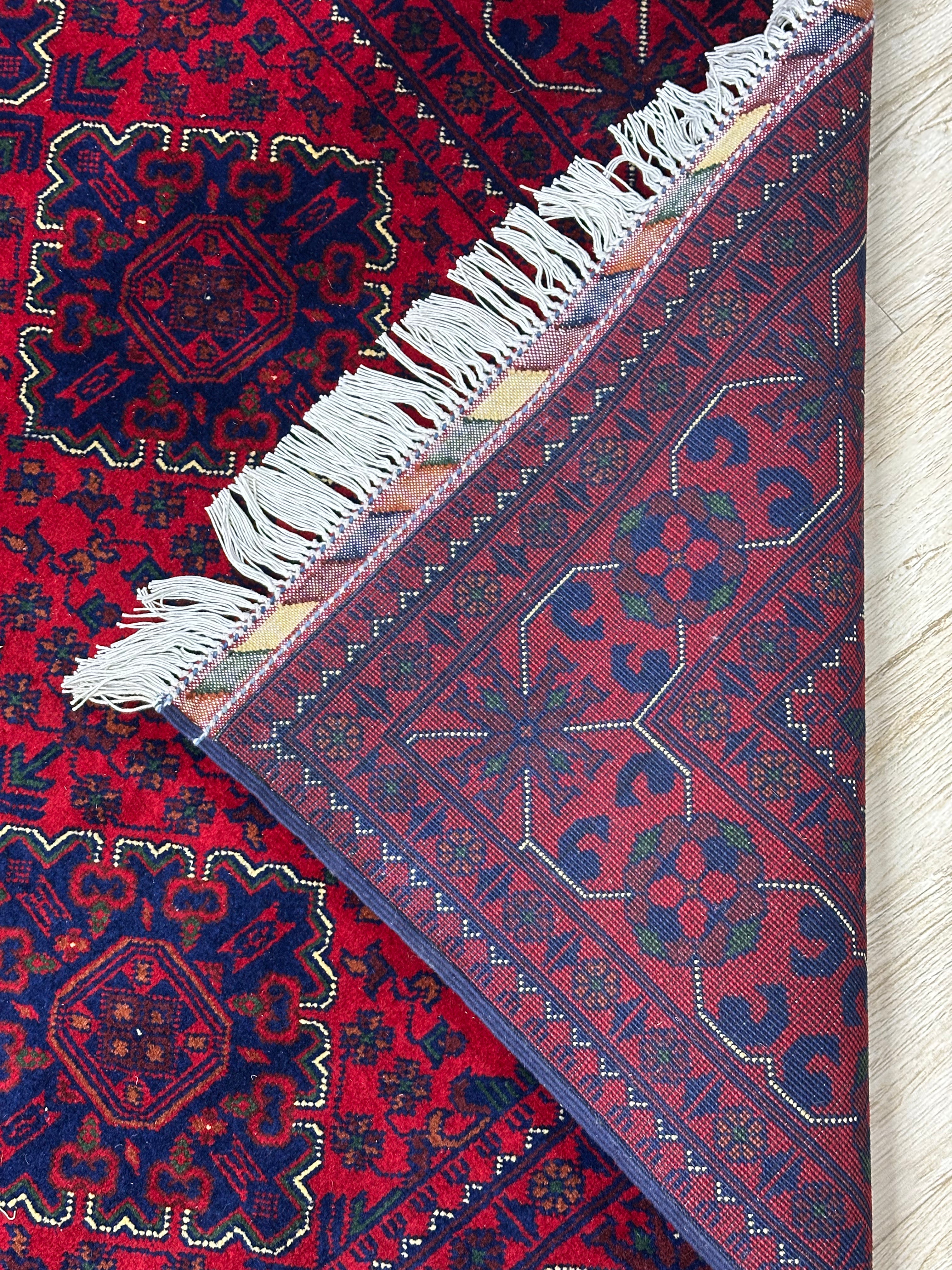 Afghani Rug 5x8 size range tribal laid flat