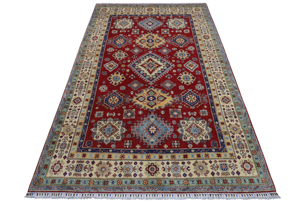 Afghani Rug 7x10 size range tribal Red Cream laid flat