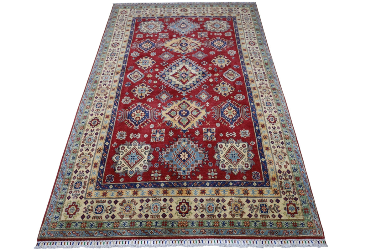 Afghani Rug 7x10 size range tribal Red Cream laid flat
