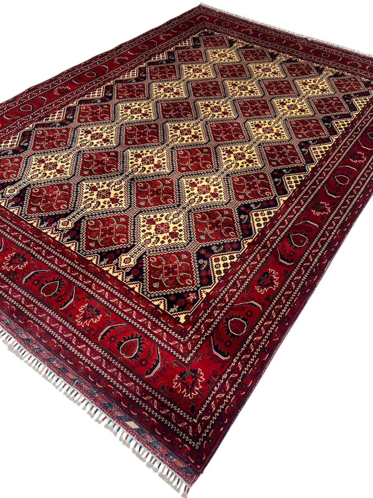 Kashi Rug 7x10 | Red, Ivory & Black | hand-knotted wool | angled view