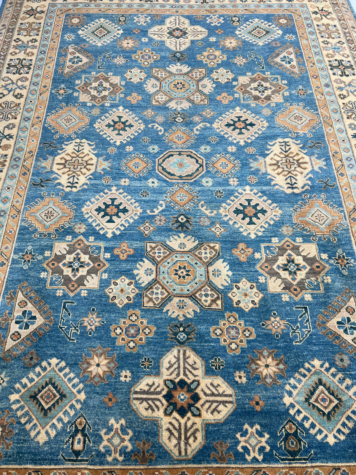 Kazak Rug 7x9 | Blue, Ivory & Gold | hand-knotted wool | close-up of pile and border